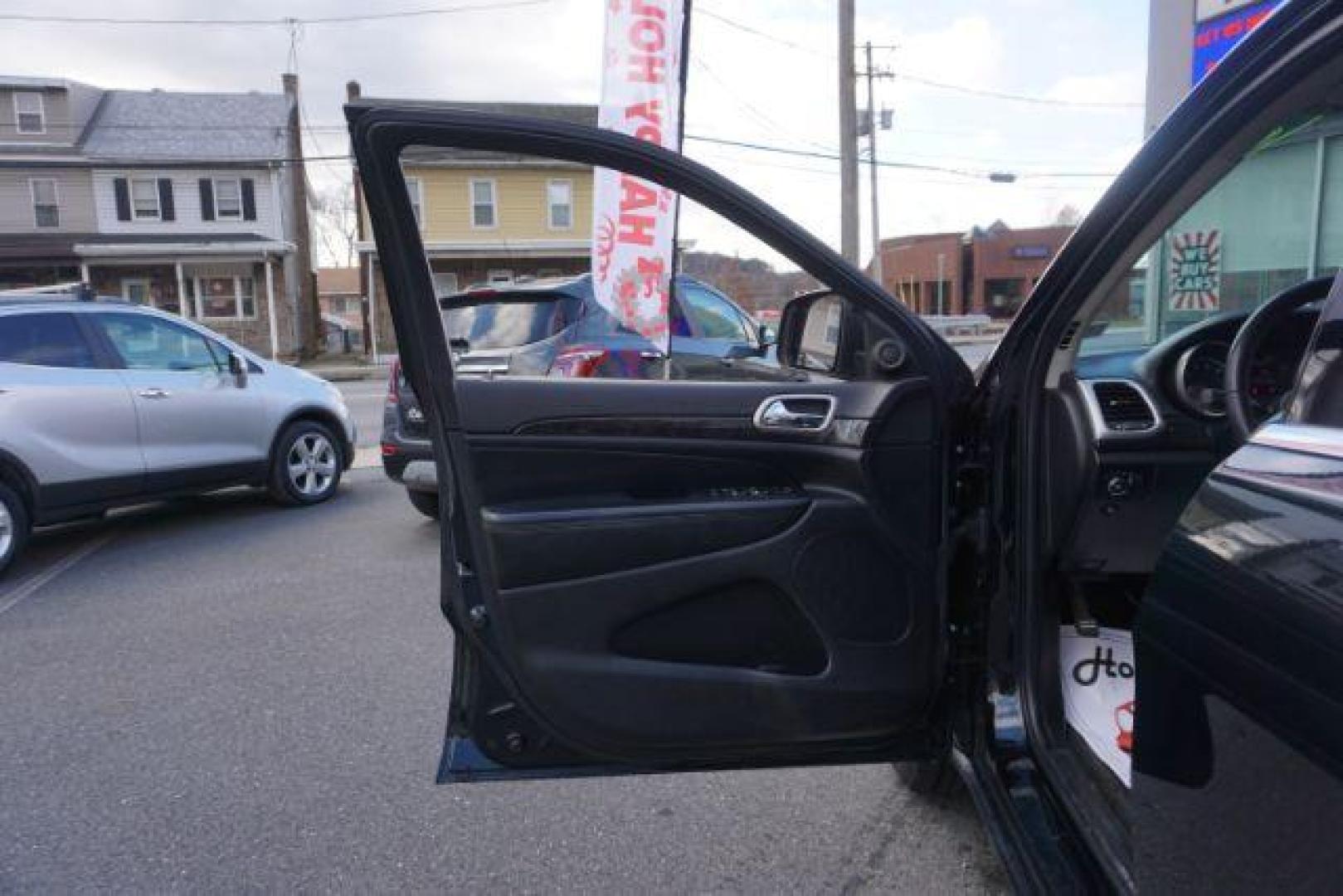 2012 Brilliant Black Crystal Pearl /Black Leather Interior Jeep Grand Cherokee Laredo 4WD (1C4RJFAGXCC) with an 3.6L V6 DOHC 24V engine, 5-Speed Automatic transmission, located at 312 Centre Ave, Schuylkill Haven, PA, 17972, (570) 593-5278, 40.638130, -76.177383 - automatic climate control, back up camera, heated front seats, leather seats, navigation, power liftgate, power sunroof, rear parking sensors - Photo#21