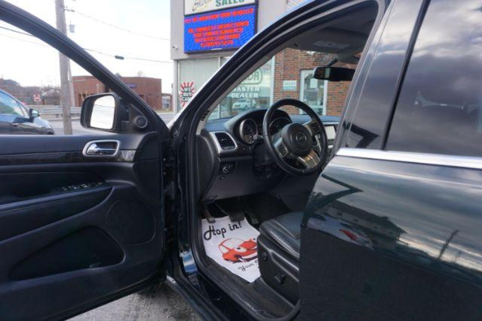 2012 Brilliant Black Crystal Pearl /Black Leather Interior Jeep Grand Cherokee Laredo 4WD (1C4RJFAGXCC) with an 3.6L V6 DOHC 24V engine, 5-Speed Automatic transmission, located at 312 Centre Ave, Schuylkill Haven, PA, 17972, (570) 593-5278, 40.638130, -76.177383 - automatic climate control, back up camera, heated front seats, leather seats, navigation, power liftgate, power sunroof, rear parking sensors - Photo#22