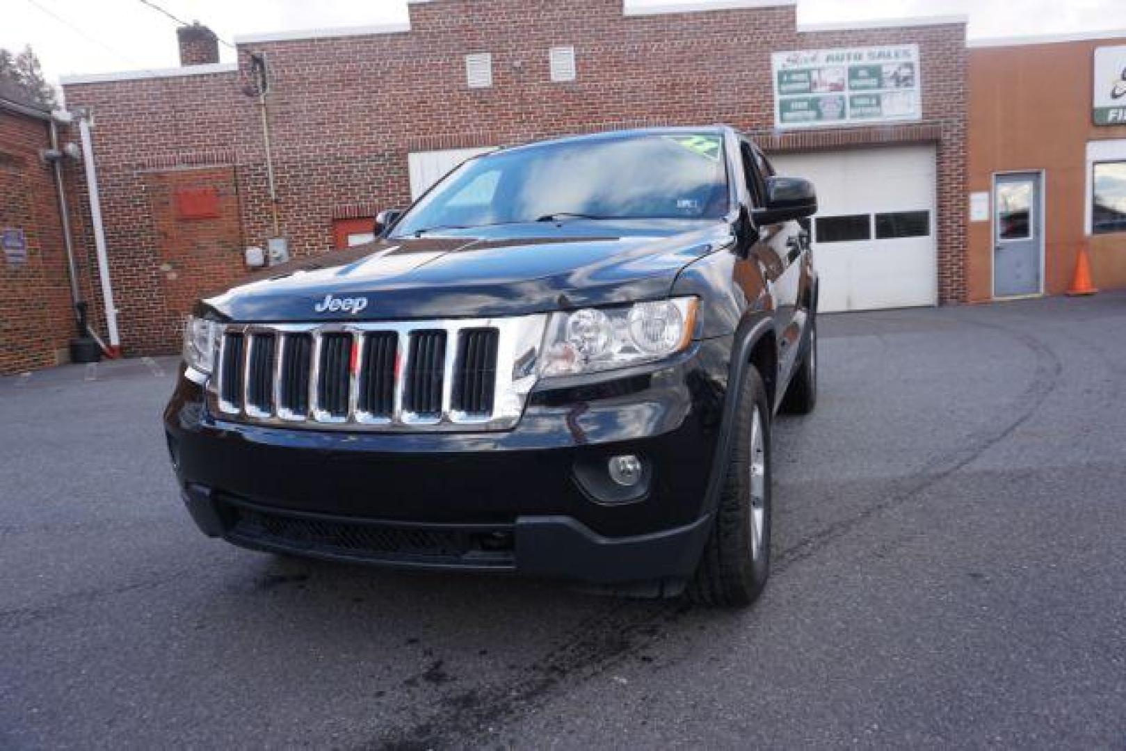 2012 Brilliant Black Crystal Pearl /Black Leather Interior Jeep Grand Cherokee Laredo 4WD (1C4RJFAGXCC) with an 3.6L V6 DOHC 24V engine, 5-Speed Automatic transmission, located at 312 Centre Ave, Schuylkill Haven, PA, 17972, (570) 593-5278, 40.638130, -76.177383 - automatic climate control, back up camera, heated front seats, leather seats, navigation, power liftgate, power sunroof, rear parking sensors - Photo#3