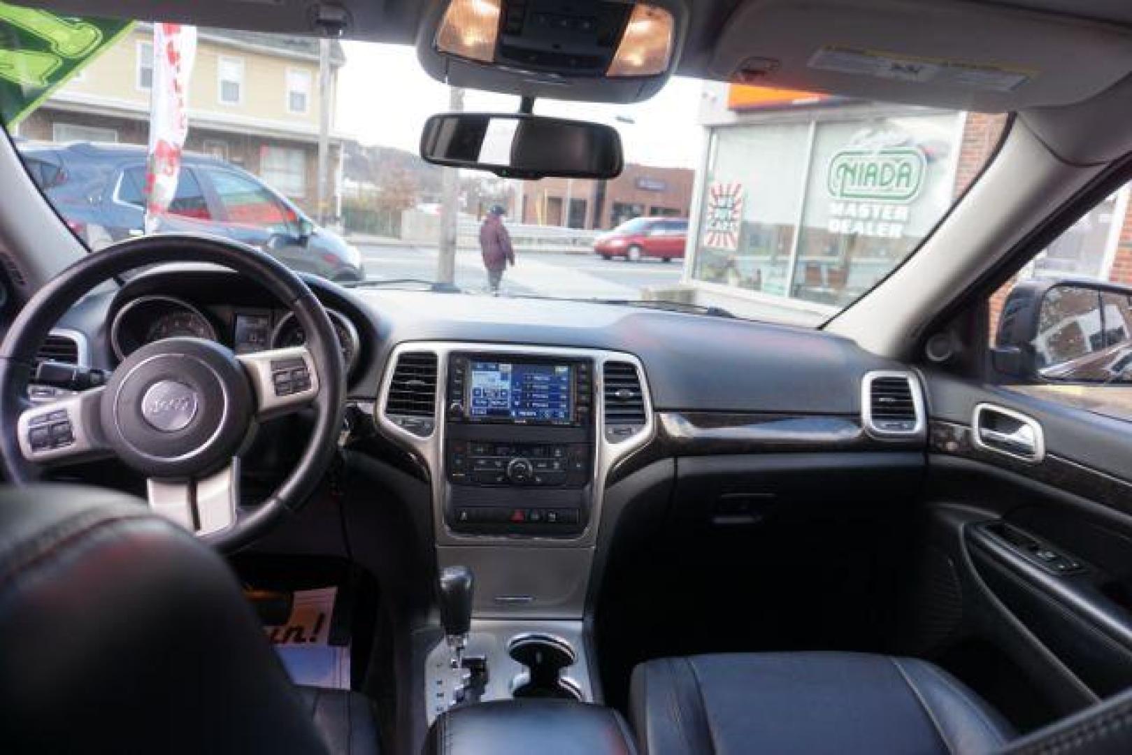 2012 Brilliant Black Crystal Pearl /Black Leather Interior Jeep Grand Cherokee Laredo 4WD (1C4RJFAGXCC) with an 3.6L V6 DOHC 24V engine, 5-Speed Automatic transmission, located at 312 Centre Ave, Schuylkill Haven, PA, 17972, (570) 593-5278, 40.638130, -76.177383 - automatic climate control, back up camera, heated front seats, leather seats, navigation, power liftgate, power sunroof, rear parking sensors - Photo#43