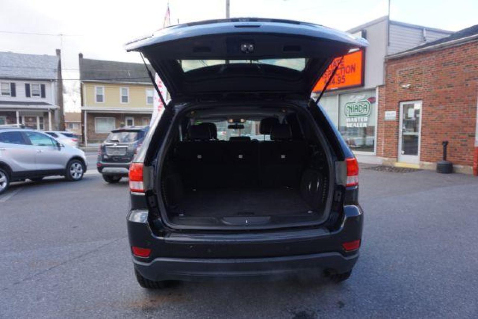 2012 Brilliant Black Crystal Pearl /Black Leather Interior Jeep Grand Cherokee Laredo 4WD (1C4RJFAGXCC) with an 3.6L V6 DOHC 24V engine, 5-Speed Automatic transmission, located at 312 Centre Ave, Schuylkill Haven, PA, 17972, (570) 593-5278, 40.638130, -76.177383 - automatic climate control, back up camera, heated front seats, leather seats, navigation, power liftgate, power sunroof, rear parking sensors - Photo#45