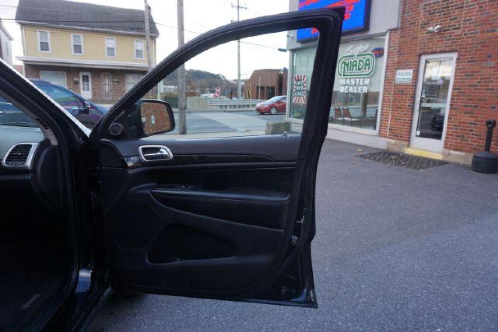 2012 Brilliant Black Crystal Pearl /Black Leather Interior Jeep Grand Cherokee Laredo 4WD (1C4RJFAGXCC) with an 3.6L V6 DOHC 24V engine, 5-Speed Automatic transmission, located at 312 Centre Ave, Schuylkill Haven, PA, 17972, (570) 593-5278, 40.638130, -76.177383 - automatic climate control, back up camera, heated front seats, leather seats, navigation, power liftgate, power sunroof, rear parking sensors - Photo#52