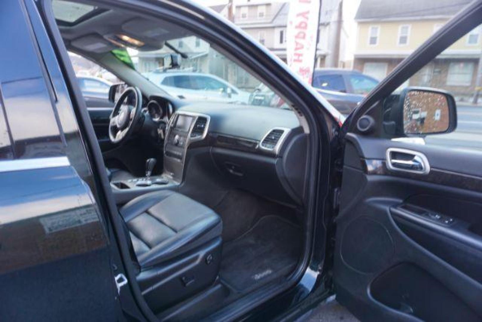 2012 Brilliant Black Crystal Pearl /Black Leather Interior Jeep Grand Cherokee Laredo 4WD (1C4RJFAGXCC) with an 3.6L V6 DOHC 24V engine, 5-Speed Automatic transmission, located at 312 Centre Ave, Schuylkill Haven, PA, 17972, (570) 593-5278, 40.638130, -76.177383 - automatic climate control, back up camera, heated front seats, leather seats, navigation, power liftgate, power sunroof, rear parking sensors - Photo#53