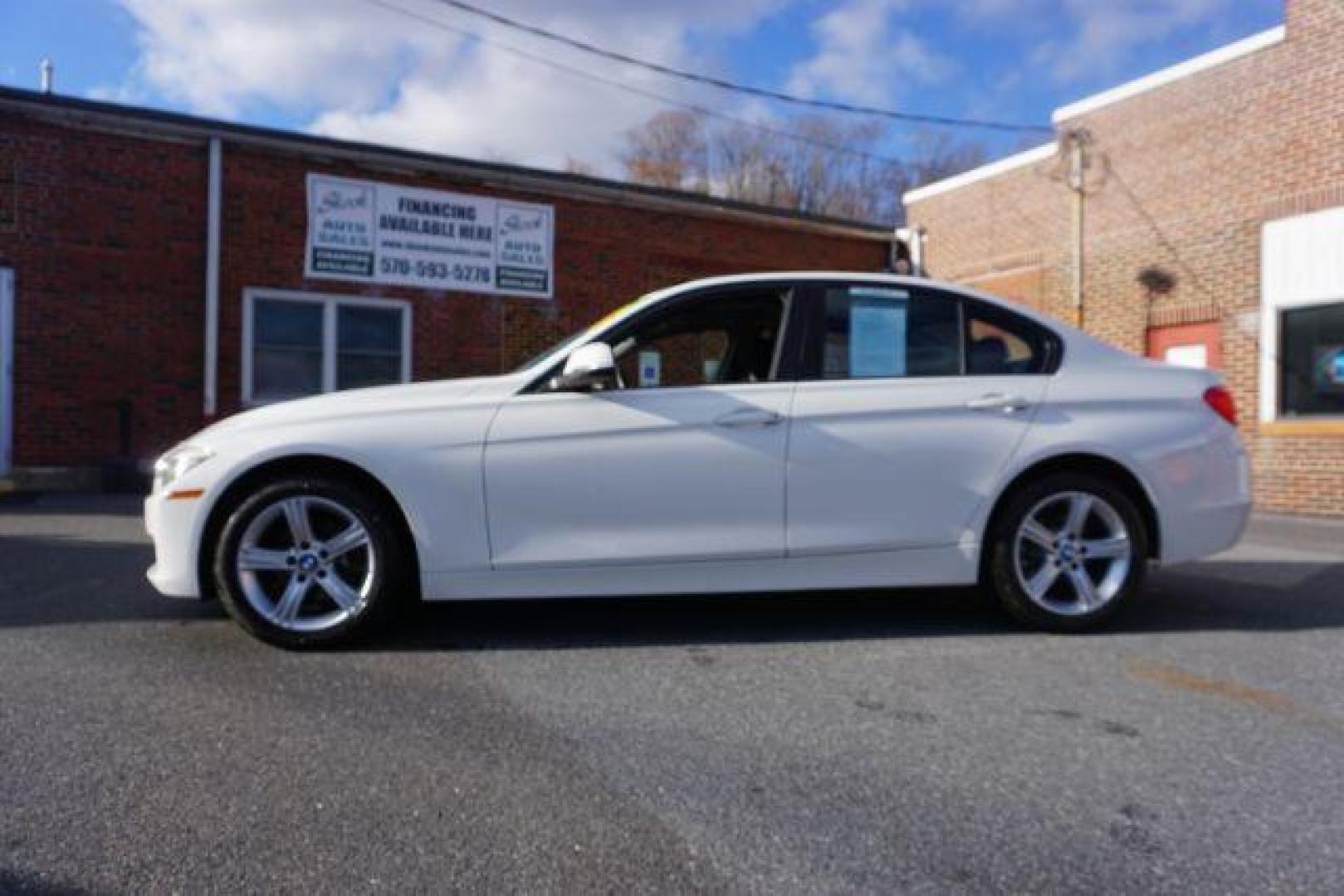 2015 Alpine White BMW 3-Series 320i xDrive (WBA3C3G53FN) with an 2.0L L4 DOHC 16V engine, 8-Speed Automatic transmission, located at 312 Centre Ave, Schuylkill Haven, PA, 17972, (570) 593-5278, 40.638130, -76.177383 - back up camera, HID headlamps, navigation, rear parking sensors - Photo#0