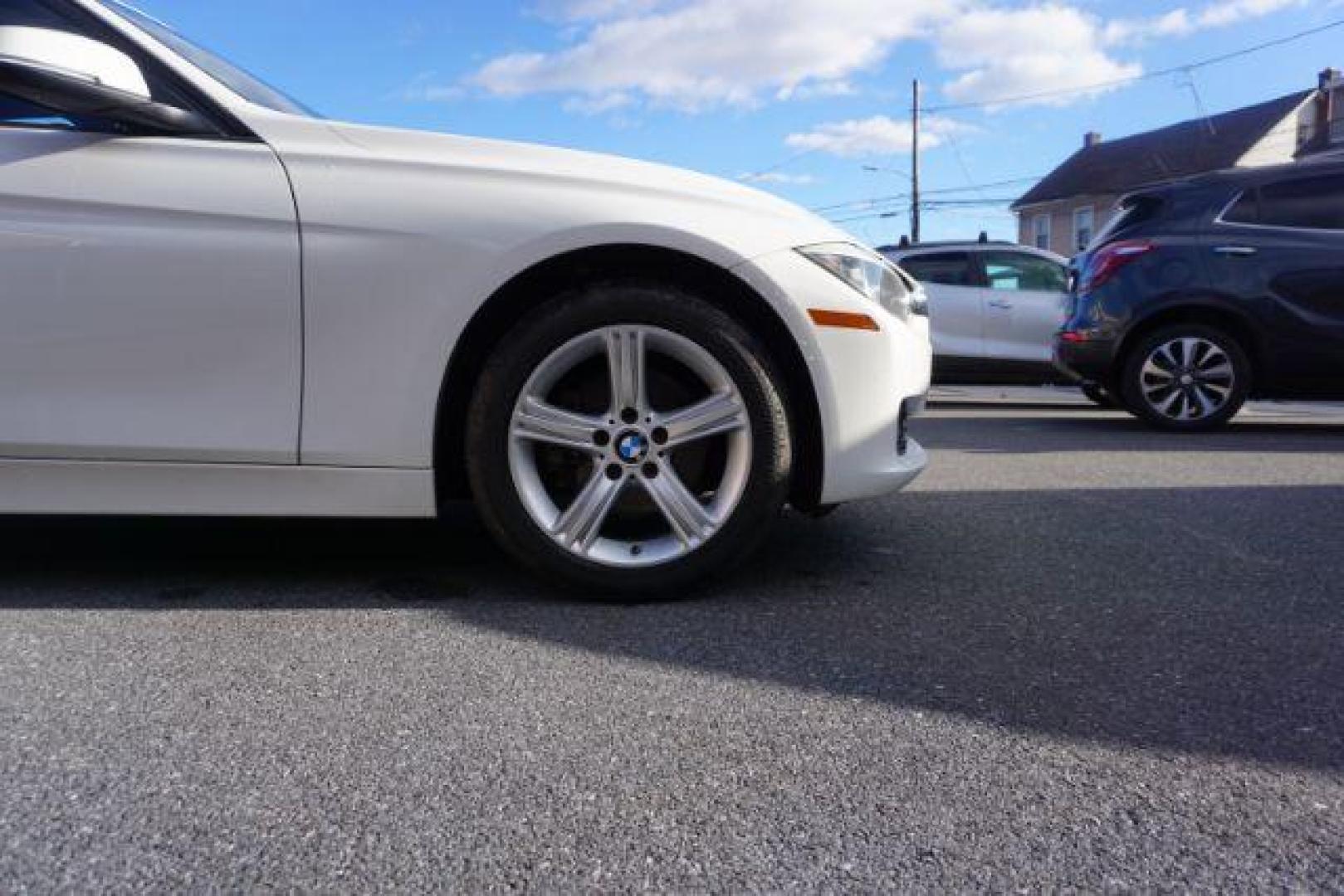 2015 Alpine White BMW 3-Series 320i xDrive (WBA3C3G53FN) with an 2.0L L4 DOHC 16V engine, 8-Speed Automatic transmission, located at 312 Centre Ave, Schuylkill Haven, PA, 17972, (570) 593-5278, 40.638130, -76.177383 - back up camera, HID headlamps, navigation, rear parking sensors - Photo#9