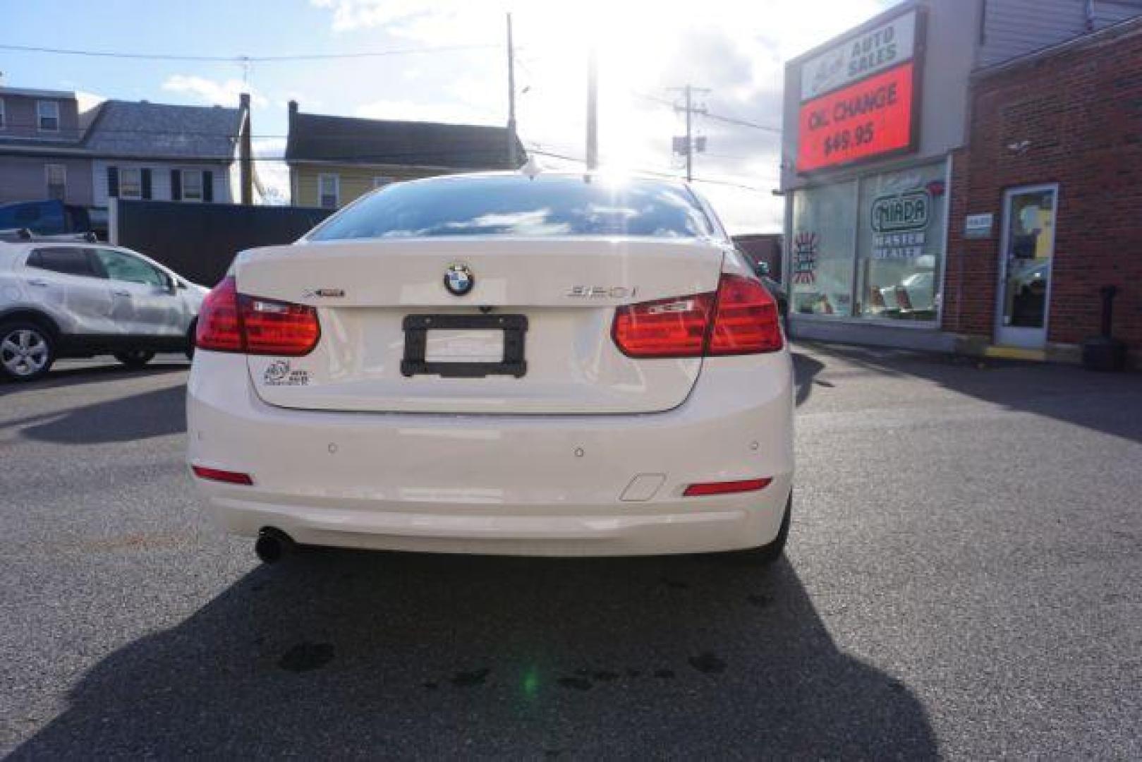 2015 Alpine White BMW 3-Series 320i xDrive (WBA3C3G53FN) with an 2.0L L4 DOHC 16V engine, 8-Speed Automatic transmission, located at 312 Centre Ave, Schuylkill Haven, PA, 17972, (570) 593-5278, 40.638130, -76.177383 - back up camera, HID headlamps, navigation, rear parking sensors - Photo#13