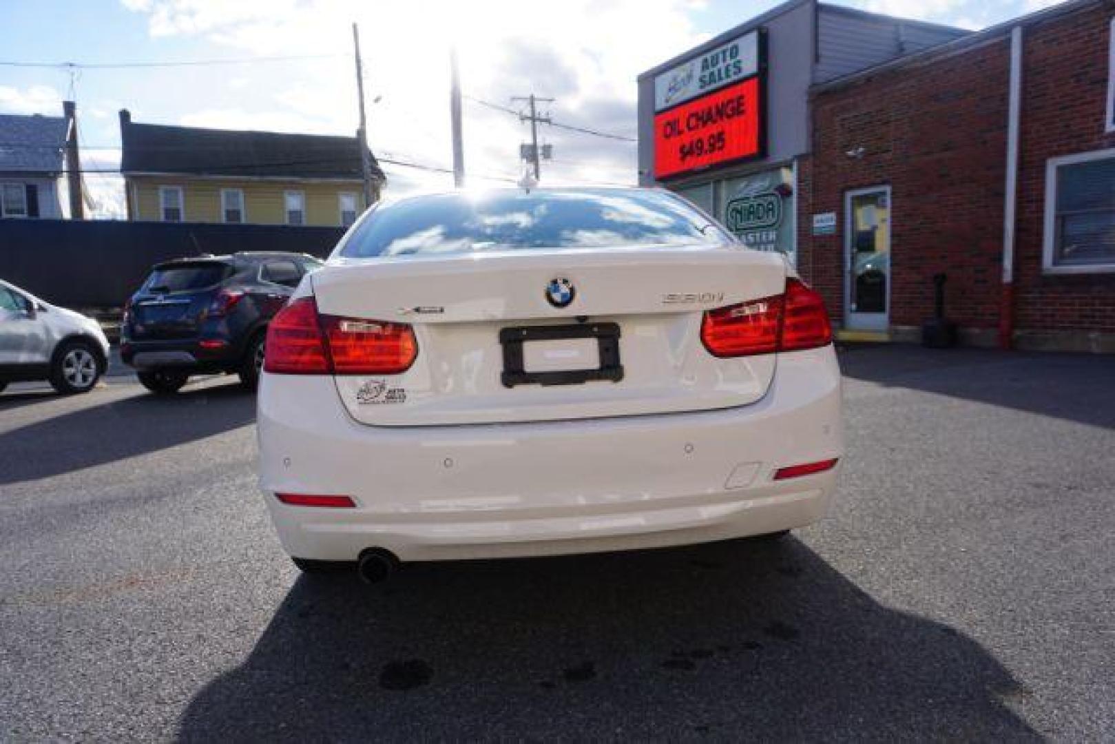 2015 Alpine White BMW 3-Series 320i xDrive (WBA3C3G53FN) with an 2.0L L4 DOHC 16V engine, 8-Speed Automatic transmission, located at 312 Centre Ave, Schuylkill Haven, PA, 17972, (570) 593-5278, 40.638130, -76.177383 - back up camera, HID headlamps, navigation, rear parking sensors - Photo#14