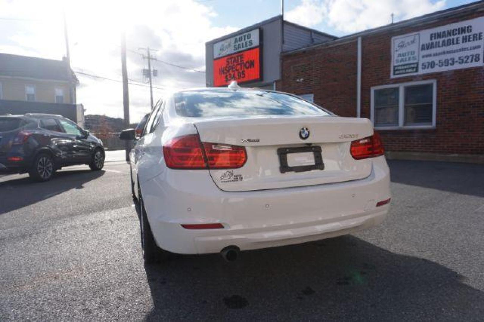 2015 Alpine White BMW 3-Series 320i xDrive (WBA3C3G53FN) with an 2.0L L4 DOHC 16V engine, 8-Speed Automatic transmission, located at 312 Centre Ave, Schuylkill Haven, PA, 17972, (570) 593-5278, 40.638130, -76.177383 - back up camera, HID headlamps, navigation, rear parking sensors - Photo#15