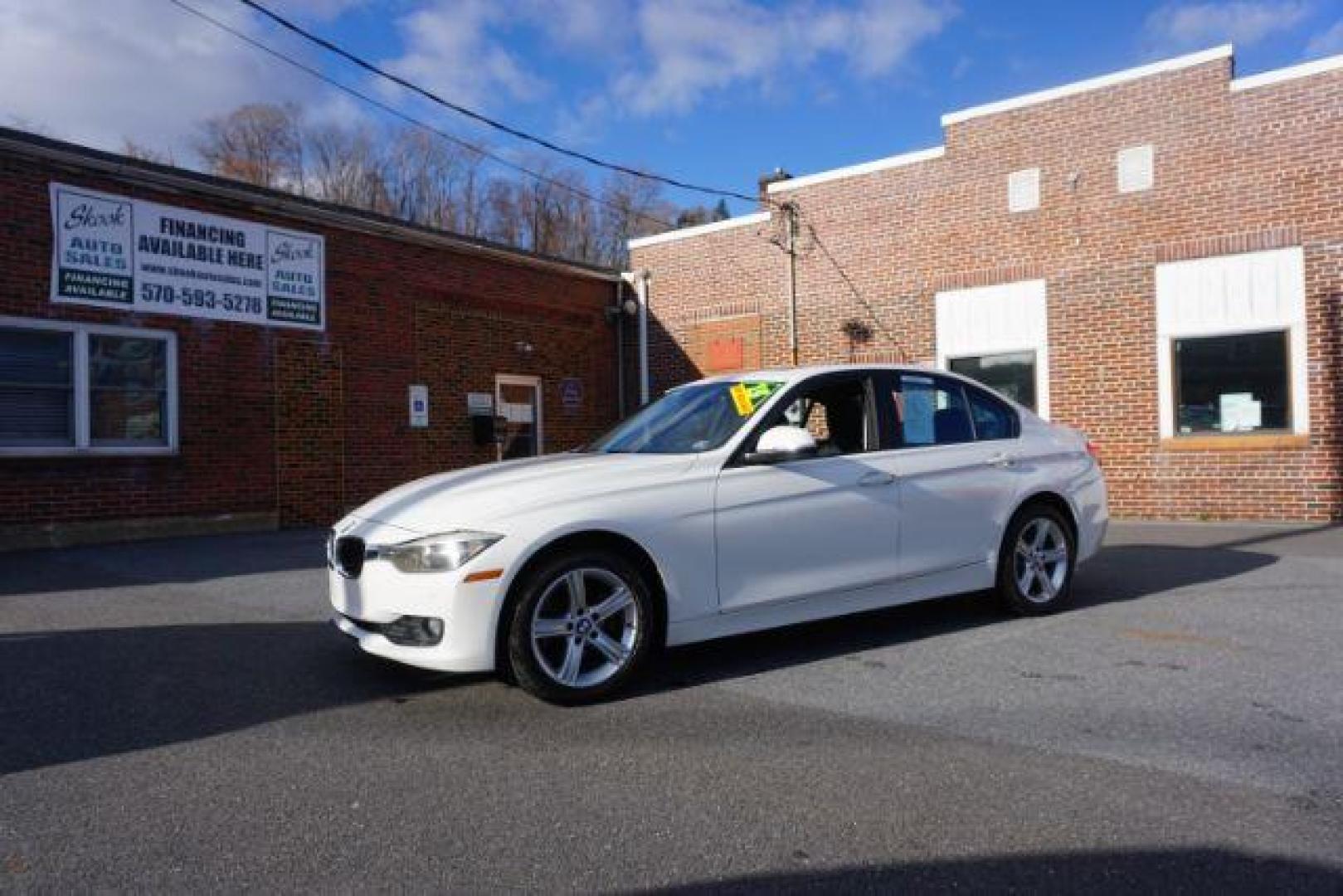 2015 Alpine White BMW 3-Series 320i xDrive (WBA3C3G53FN) with an 2.0L L4 DOHC 16V engine, 8-Speed Automatic transmission, located at 312 Centre Ave, Schuylkill Haven, PA, 17972, (570) 593-5278, 40.638130, -76.177383 - back up camera, HID headlamps, navigation, rear parking sensors - Photo#1