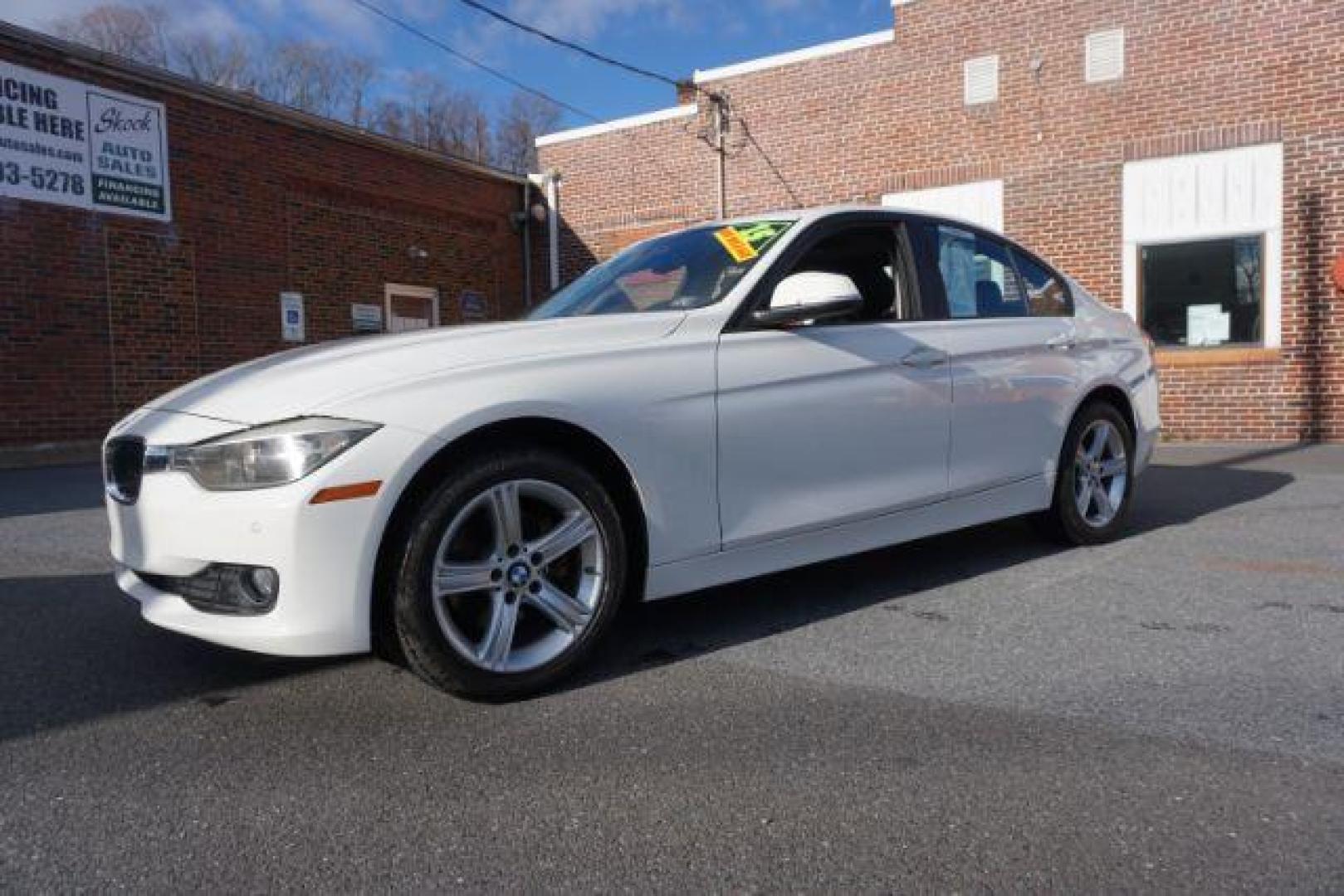 2015 Alpine White BMW 3-Series 320i xDrive (WBA3C3G53FN) with an 2.0L L4 DOHC 16V engine, 8-Speed Automatic transmission, located at 312 Centre Ave, Schuylkill Haven, PA, 17972, (570) 593-5278, 40.638130, -76.177383 - back up camera, HID headlamps, navigation, rear parking sensors - Photo#2