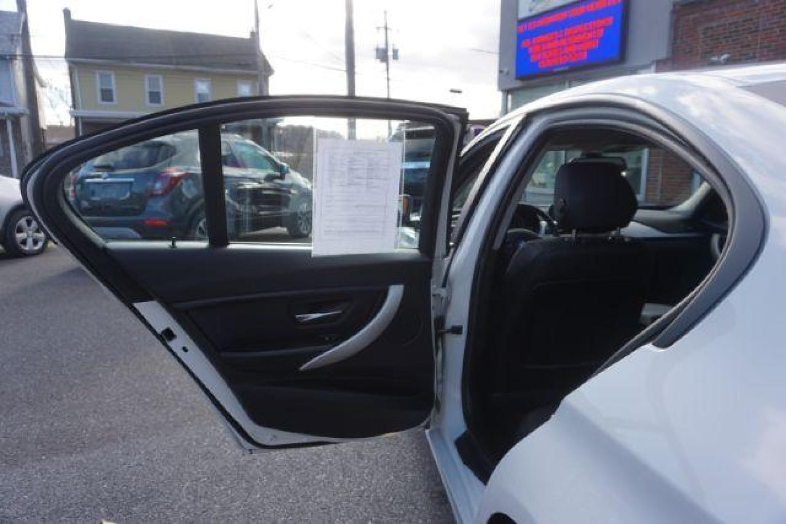 2015 Alpine White BMW 3-Series 320i xDrive (WBA3C3G53FN) with an 2.0L L4 DOHC 16V engine, 8-Speed Automatic transmission, located at 312 Centre Ave, Schuylkill Haven, PA, 17972, (570) 593-5278, 40.638130, -76.177383 - back up camera, HID headlamps, navigation, rear parking sensors - Photo#37