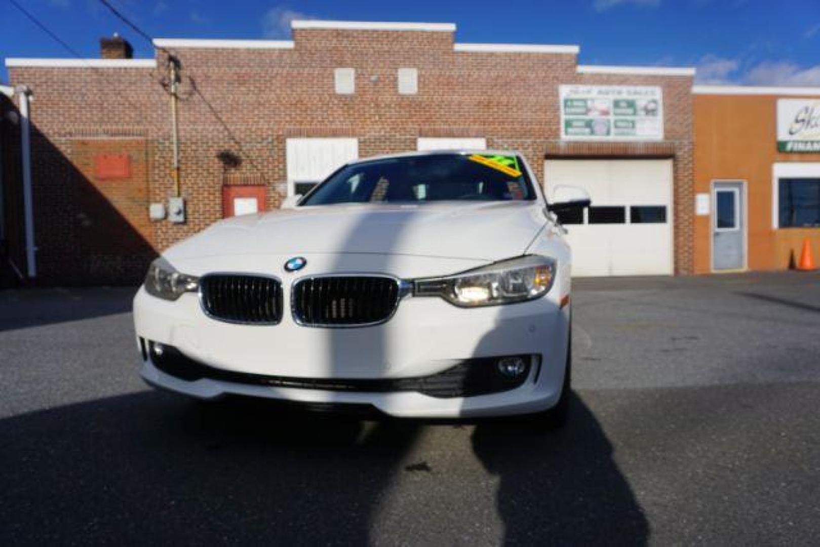 2015 Alpine White BMW 3-Series 320i xDrive (WBA3C3G53FN) with an 2.0L L4 DOHC 16V engine, 8-Speed Automatic transmission, located at 312 Centre Ave, Schuylkill Haven, PA, 17972, (570) 593-5278, 40.638130, -76.177383 - back up camera, HID headlamps, navigation, rear parking sensors - Photo#3