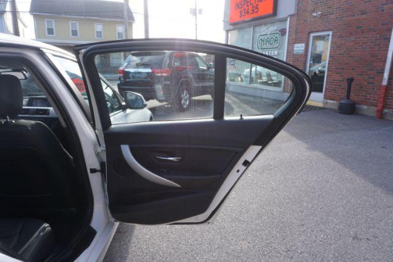 2015 Alpine White BMW 3-Series 320i xDrive (WBA3C3G53FN) with an 2.0L L4 DOHC 16V engine, 8-Speed Automatic transmission, located at 312 Centre Ave, Schuylkill Haven, PA, 17972, (570) 593-5278, 40.638130, -76.177383 - back up camera, HID headlamps, navigation, rear parking sensors - Photo#49