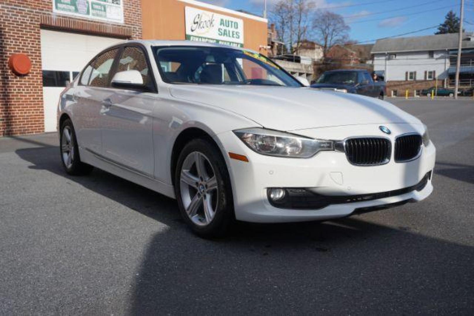 2015 Alpine White BMW 3-Series 320i xDrive (WBA3C3G53FN) with an 2.0L L4 DOHC 16V engine, 8-Speed Automatic transmission, located at 312 Centre Ave, Schuylkill Haven, PA, 17972, (570) 593-5278, 40.638130, -76.177383 - back up camera, HID headlamps, navigation, rear parking sensors - Photo#6