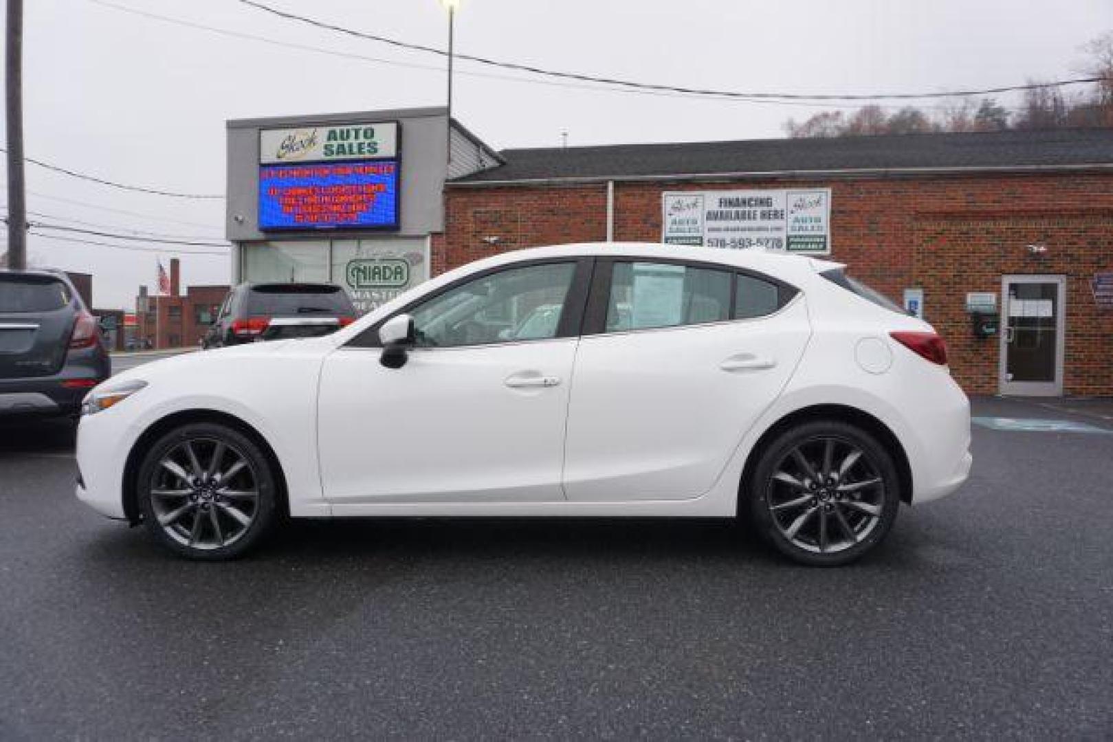 2018 Snowflake White Pearl Mica /beige Mazda MAZDA3 s Grand Touring AT 5-Door (3MZBN1M32JM) with an 2.5L L4 DOHC 16V engine, 6-Speed Automatic transmission, located at 312 Centre Ave, Schuylkill Haven, PA, 17972, (570) 593-5278, 40.638130, -76.177383 - adaptive cruise control, navigation system, rear parking sensors - Photo#19