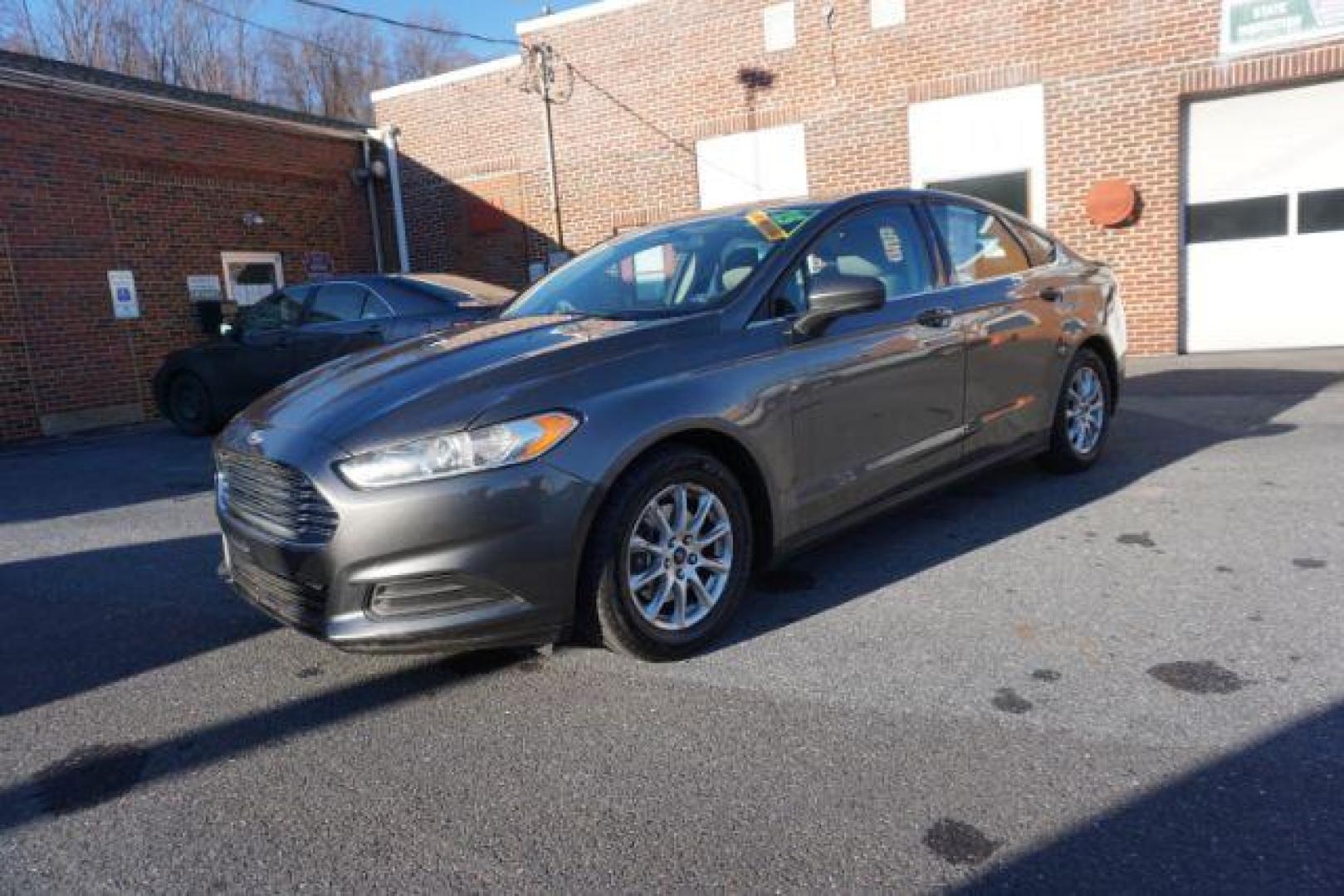 2015 Magnetic /Earth Gray Ford Fusion S (3FA6P0G73FR) with an 2.5L L4 DOHC 16V engine, 6-Speed Automatic transmission, located at 312 Centre Ave, Schuylkill Haven, PA, 17972, (570) 593-5278, 40.638130, -76.177383 - Photo#2