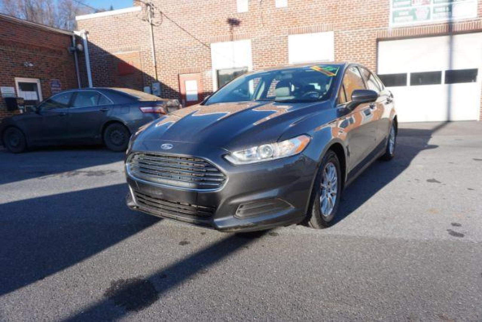 2015 Magnetic /Earth Gray Ford Fusion S (3FA6P0G73FR) with an 2.5L L4 DOHC 16V engine, 6-Speed Automatic transmission, located at 312 Centre Ave, Schuylkill Haven, PA, 17972, (570) 593-5278, 40.638130, -76.177383 - Photo#3