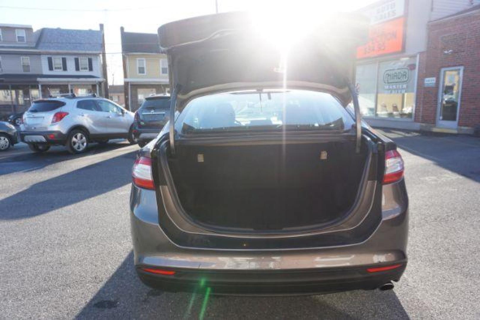 2015 Magnetic /Earth Gray Ford Fusion S (3FA6P0G73FR) with an 2.5L L4 DOHC 16V engine, 6-Speed Automatic transmission, located at 312 Centre Ave, Schuylkill Haven, PA, 17972, (570) 593-5278, 40.638130, -76.177383 - Photo#40