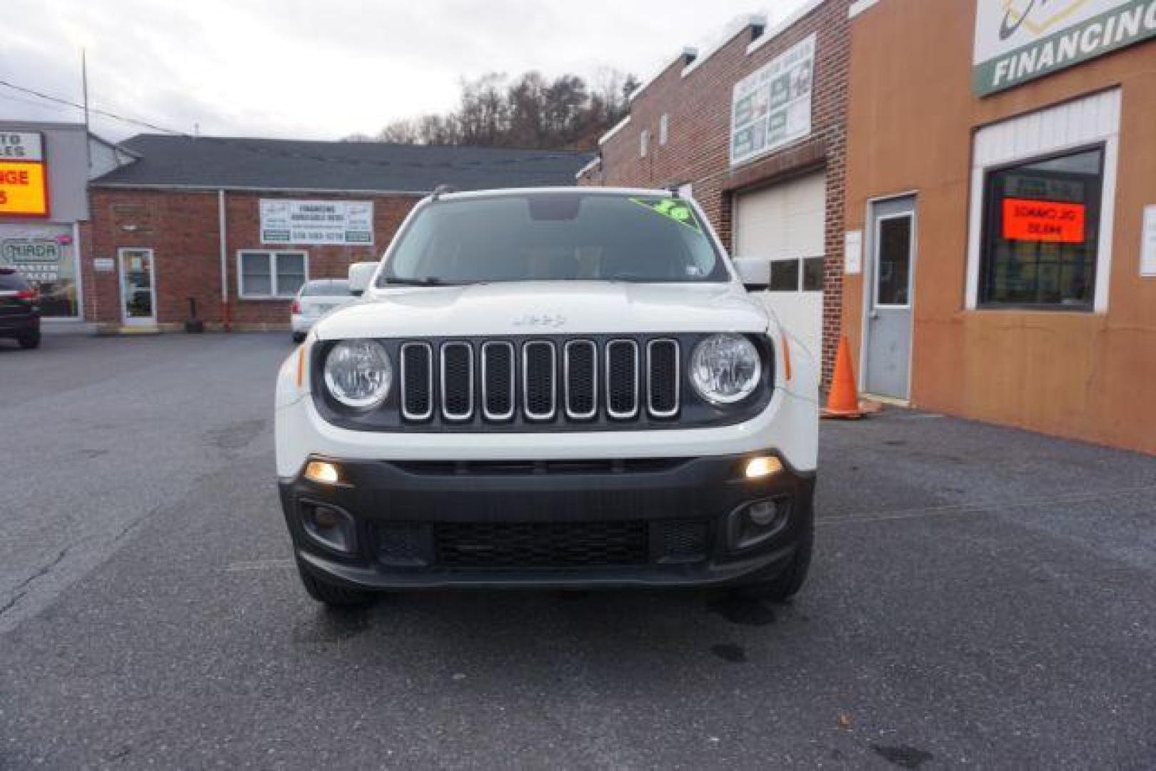 2016 Alpine White /Black, cloth Jeep Renegade Latitude 4WD (ZACCJBBT9GP) with an 2.4L L4 DOHC 16V engine, 6-Speed Manual transmission, located at 312 Centre Ave, Schuylkill Haven, PA, 17972, (570) 593-5278, 40.638130, -76.177383 - bluetooth connection, luggage rack, passive keyless entry, remote engine starter, - Photo#4