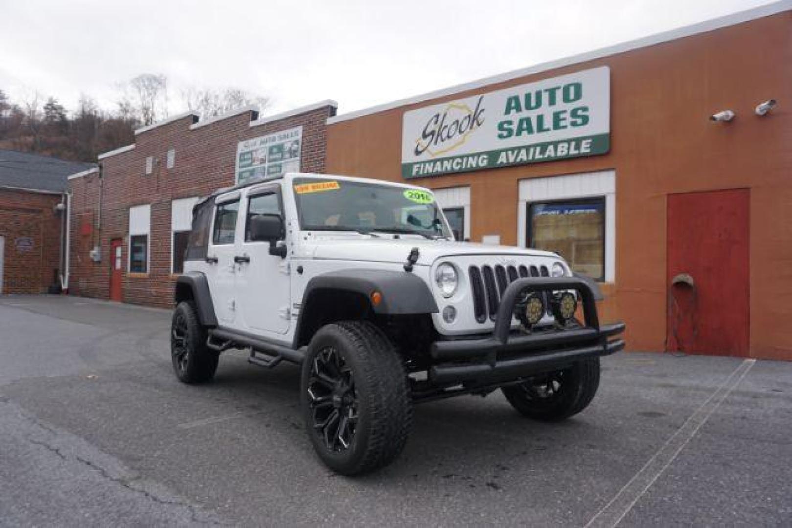 2016 Bright White Clear Coat /Black, cloth Jeep Wrangler Unlimited Sport 4WD (1C4BJWDG3GL) with an 3.6L V6 DOHC 24V FFV engine, located at 312 Centre Ave, Schuylkill Haven, PA, 17972, (570) 593-5278, 40.638130, -76.177383 - Photo#0