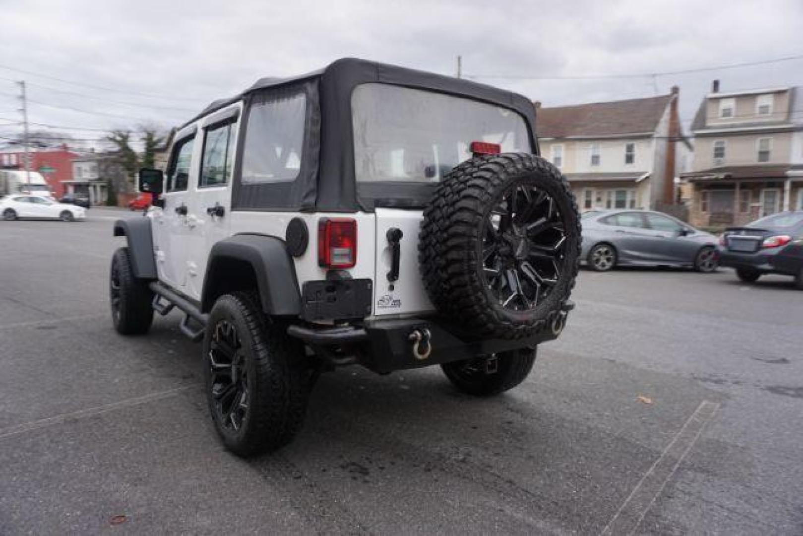 2016 Bright White Clear Coat /Black, cloth Jeep Wrangler Unlimited Sport 4WD (1C4BJWDG3GL) with an 3.6L V6 DOHC 24V FFV engine, located at 312 Centre Ave, Schuylkill Haven, PA, 17972, (570) 593-5278, 40.638130, -76.177383 - Photo#9