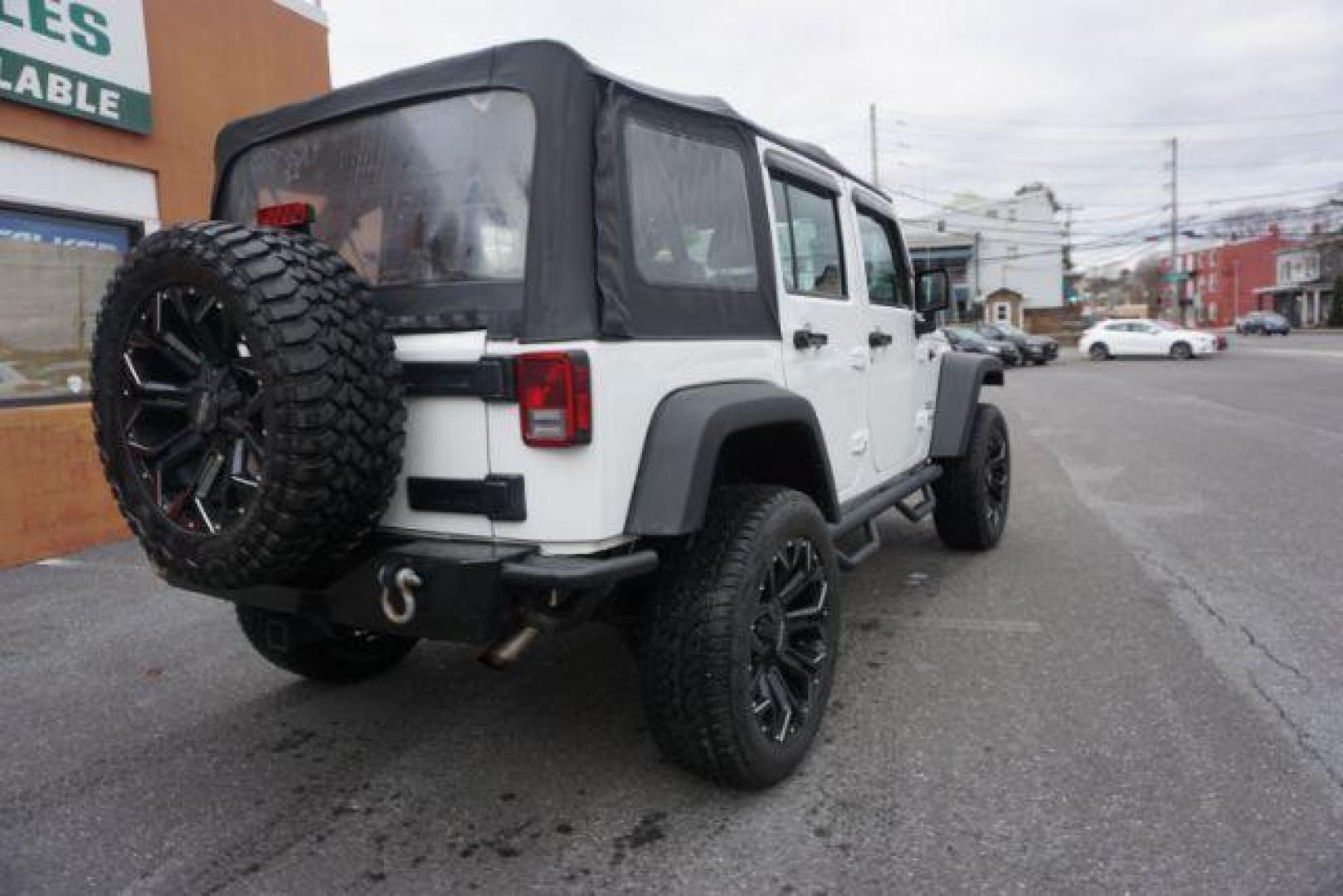 2016 Bright White Clear Coat /Black, cloth Jeep Wrangler Unlimited Sport 4WD (1C4BJWDG3GL) with an 3.6L V6 DOHC 24V FFV engine, located at 312 Centre Ave, Schuylkill Haven, PA, 17972, (570) 593-5278, 40.638130, -76.177383 - Photo#13