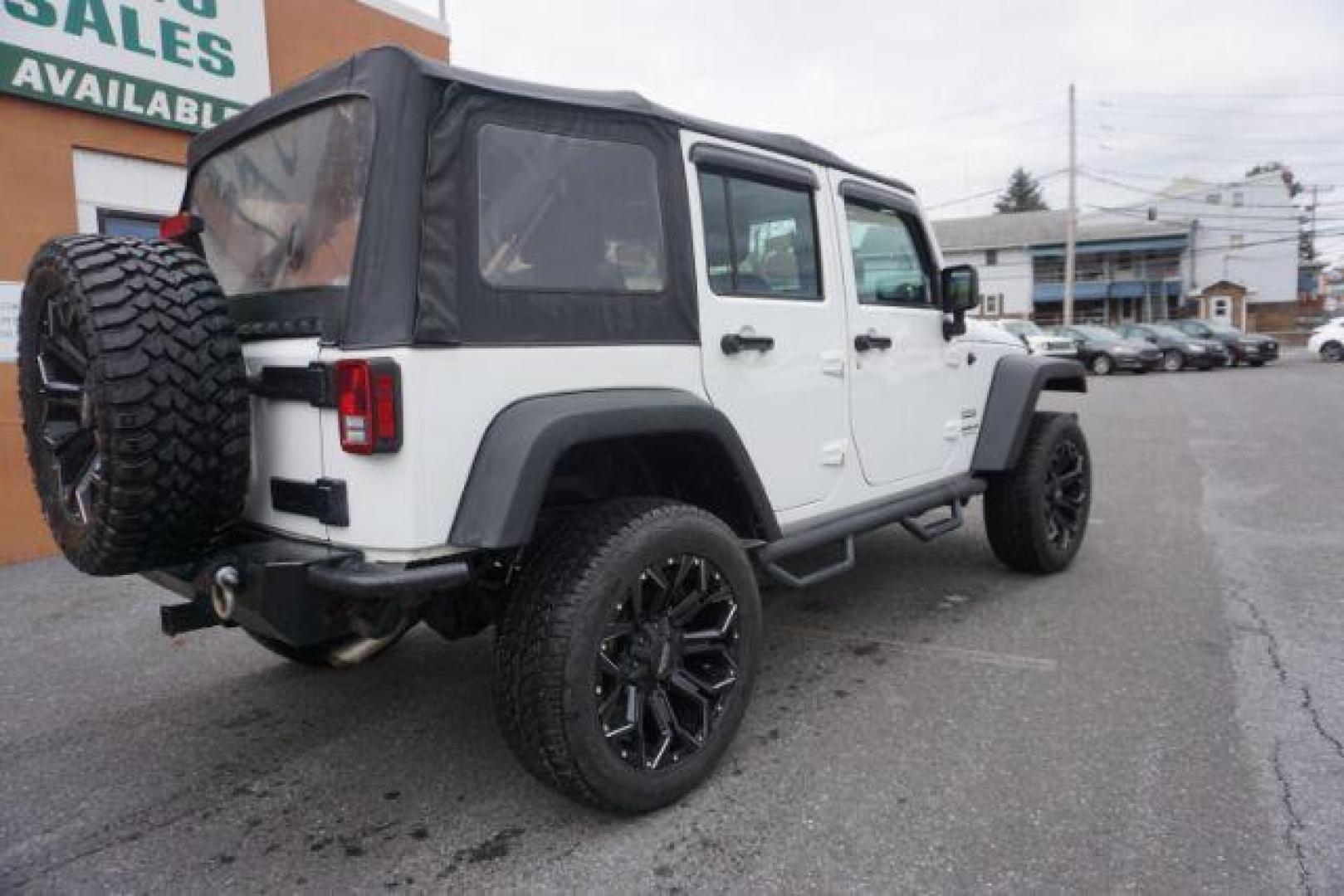 2016 Bright White Clear Coat /Black, cloth Jeep Wrangler Unlimited Sport 4WD (1C4BJWDG3GL) with an 3.6L V6 DOHC 24V FFV engine, located at 312 Centre Ave, Schuylkill Haven, PA, 17972, (570) 593-5278, 40.638130, -76.177383 - Photo#14