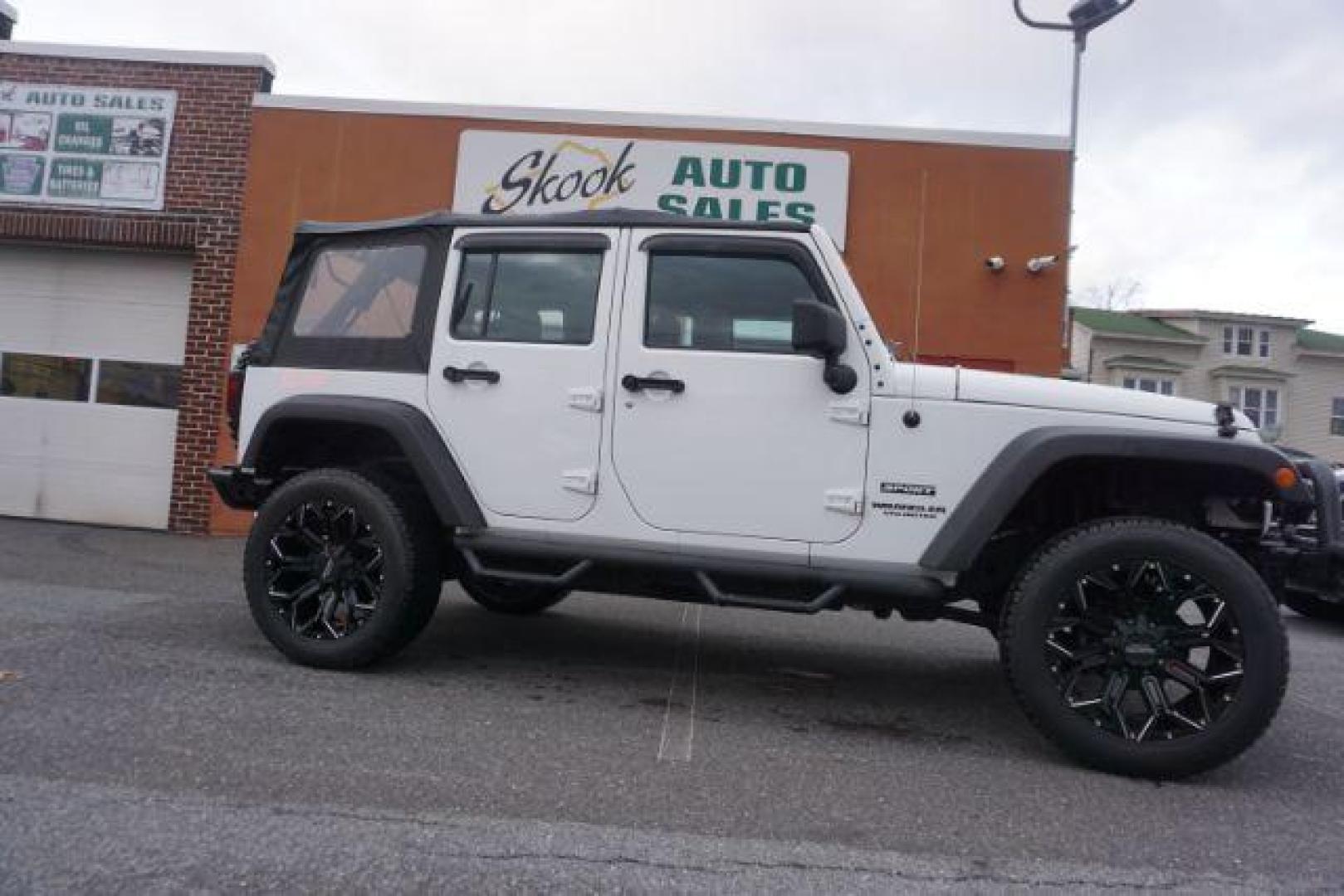 2016 Bright White Clear Coat /Black, cloth Jeep Wrangler Unlimited Sport 4WD (1C4BJWDG3GL) with an 3.6L V6 DOHC 24V FFV engine, located at 312 Centre Ave, Schuylkill Haven, PA, 17972, (570) 593-5278, 40.638130, -76.177383 - Photo#17