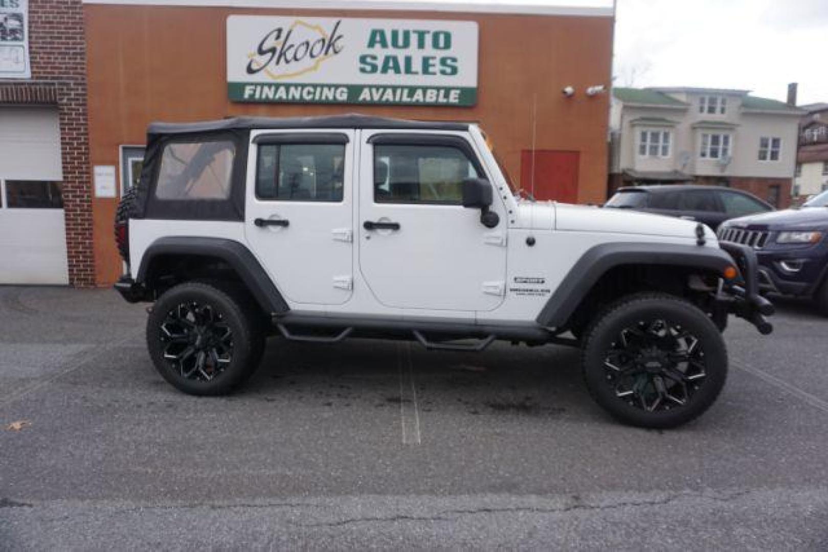 2016 Bright White Clear Coat /Black, cloth Jeep Wrangler Unlimited Sport 4WD (1C4BJWDG3GL) with an 3.6L V6 DOHC 24V FFV engine, located at 312 Centre Ave, Schuylkill Haven, PA, 17972, (570) 593-5278, 40.638130, -76.177383 - Photo#18