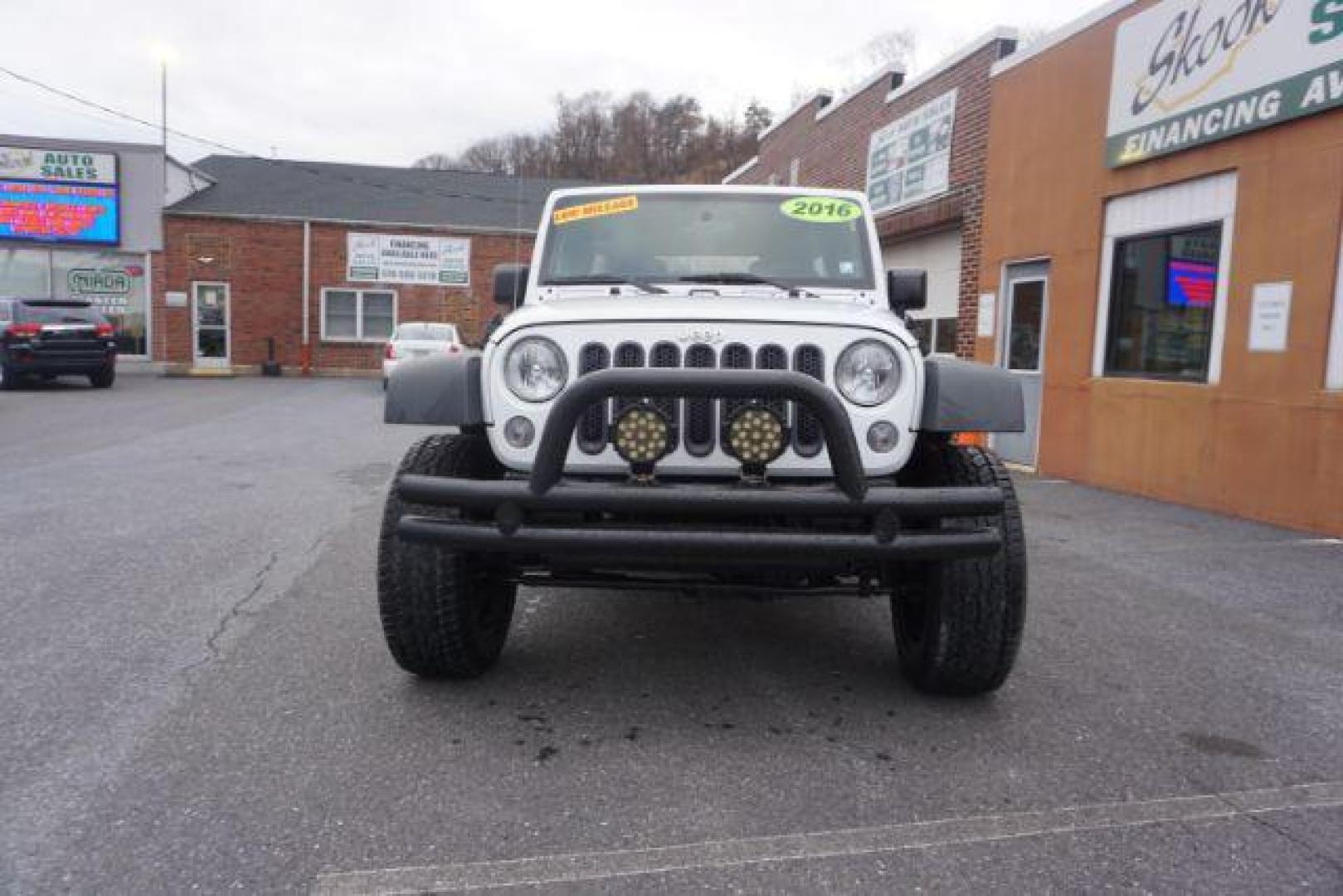 2016 Bright White Clear Coat /Black, cloth Jeep Wrangler Unlimited Sport 4WD (1C4BJWDG3GL) with an 3.6L V6 DOHC 24V FFV engine, located at 312 Centre Ave, Schuylkill Haven, PA, 17972, (570) 593-5278, 40.638130, -76.177383 - Photo#1