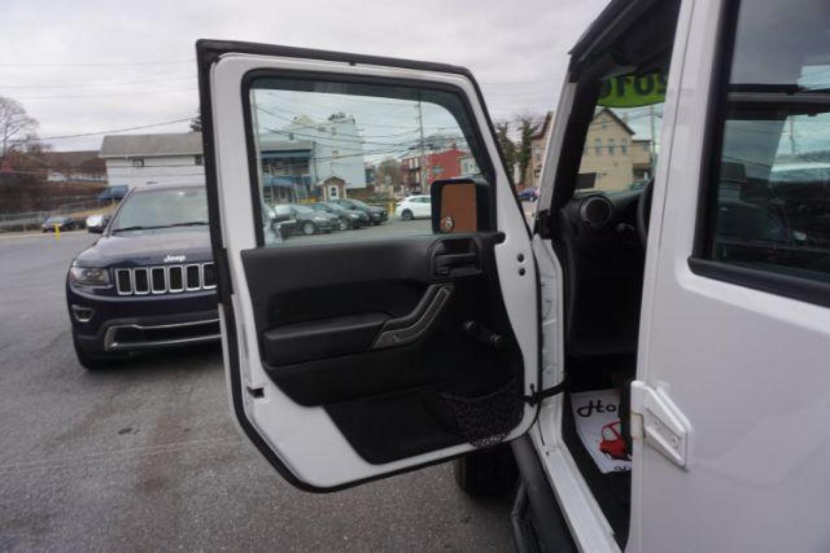 2016 Bright White Clear Coat /Black, cloth Jeep Wrangler Unlimited Sport 4WD (1C4BJWDG3GL) with an 3.6L V6 DOHC 24V FFV engine, located at 312 Centre Ave, Schuylkill Haven, PA, 17972, (570) 593-5278, 40.638130, -76.177383 - Photo#20