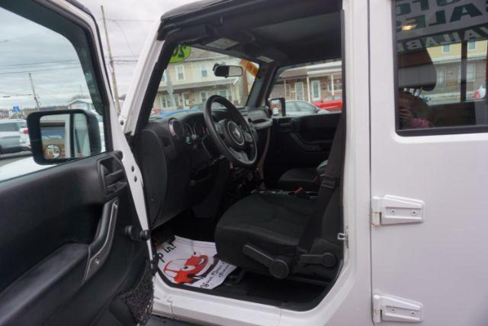 2016 Bright White Clear Coat /Black, cloth Jeep Wrangler Unlimited Sport 4WD (1C4BJWDG3GL) with an 3.6L V6 DOHC 24V FFV engine, located at 312 Centre Ave, Schuylkill Haven, PA, 17972, (570) 593-5278, 40.638130, -76.177383 - Photo#21