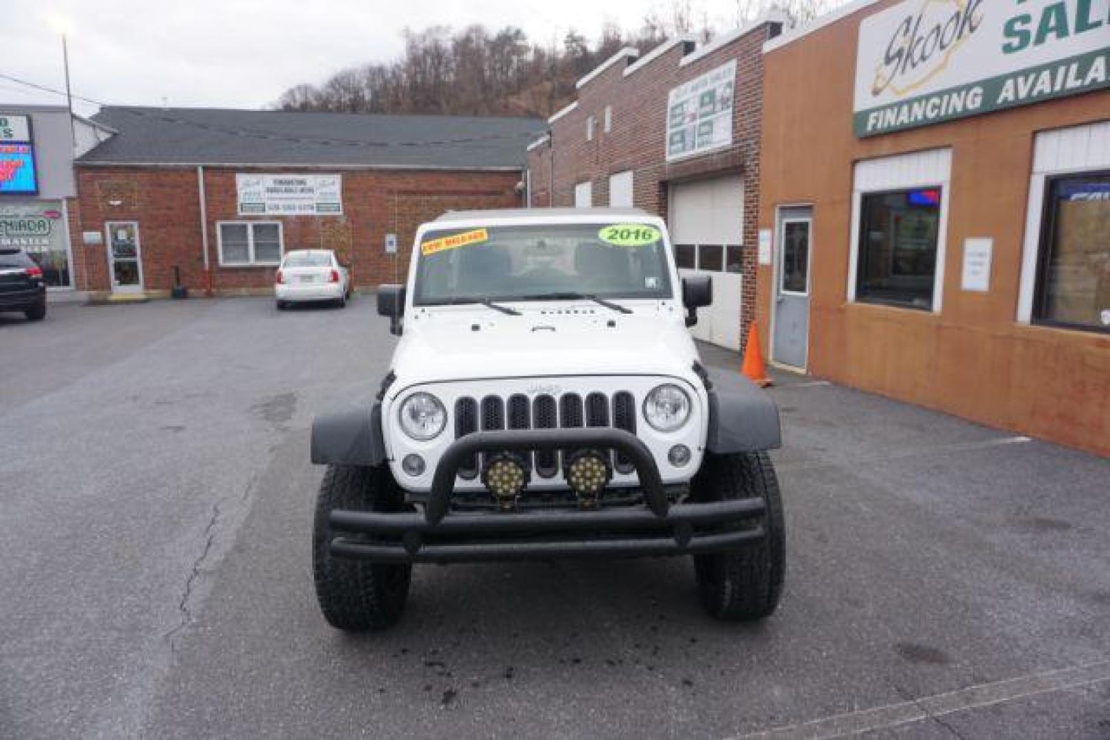 2016 Bright White Clear Coat /Black, cloth Jeep Wrangler Unlimited Sport 4WD (1C4BJWDG3GL) with an 3.6L V6 DOHC 24V FFV engine, located at 312 Centre Ave, Schuylkill Haven, PA, 17972, (570) 593-5278, 40.638130, -76.177383 - Photo#2