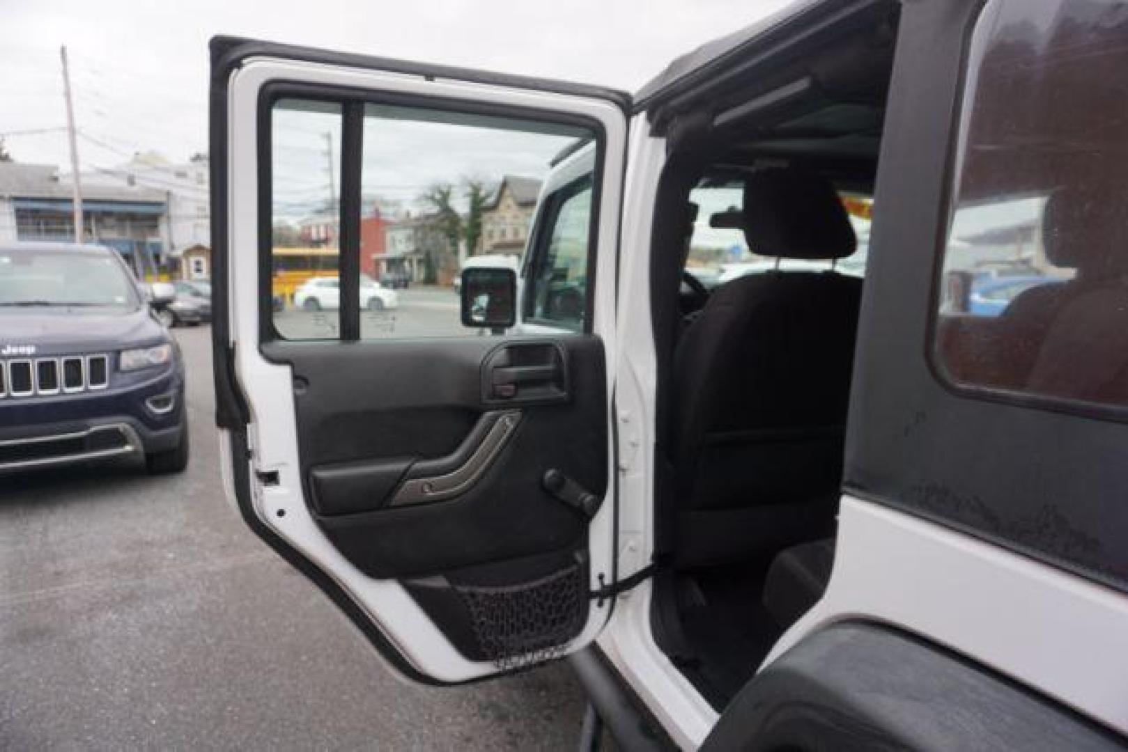 2016 Bright White Clear Coat /Black, cloth Jeep Wrangler Unlimited Sport 4WD (1C4BJWDG3GL) with an 3.6L V6 DOHC 24V FFV engine, located at 312 Centre Ave, Schuylkill Haven, PA, 17972, (570) 593-5278, 40.638130, -76.177383 - Photo#34