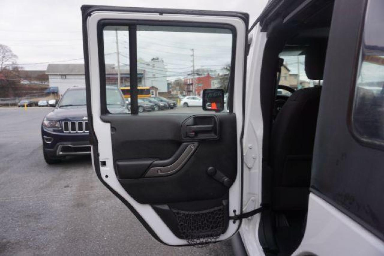 2016 Bright White Clear Coat /Black, cloth Jeep Wrangler Unlimited Sport 4WD (1C4BJWDG3GL) with an 3.6L V6 DOHC 24V FFV engine, located at 312 Centre Ave, Schuylkill Haven, PA, 17972, (570) 593-5278, 40.638130, -76.177383 - Photo#35