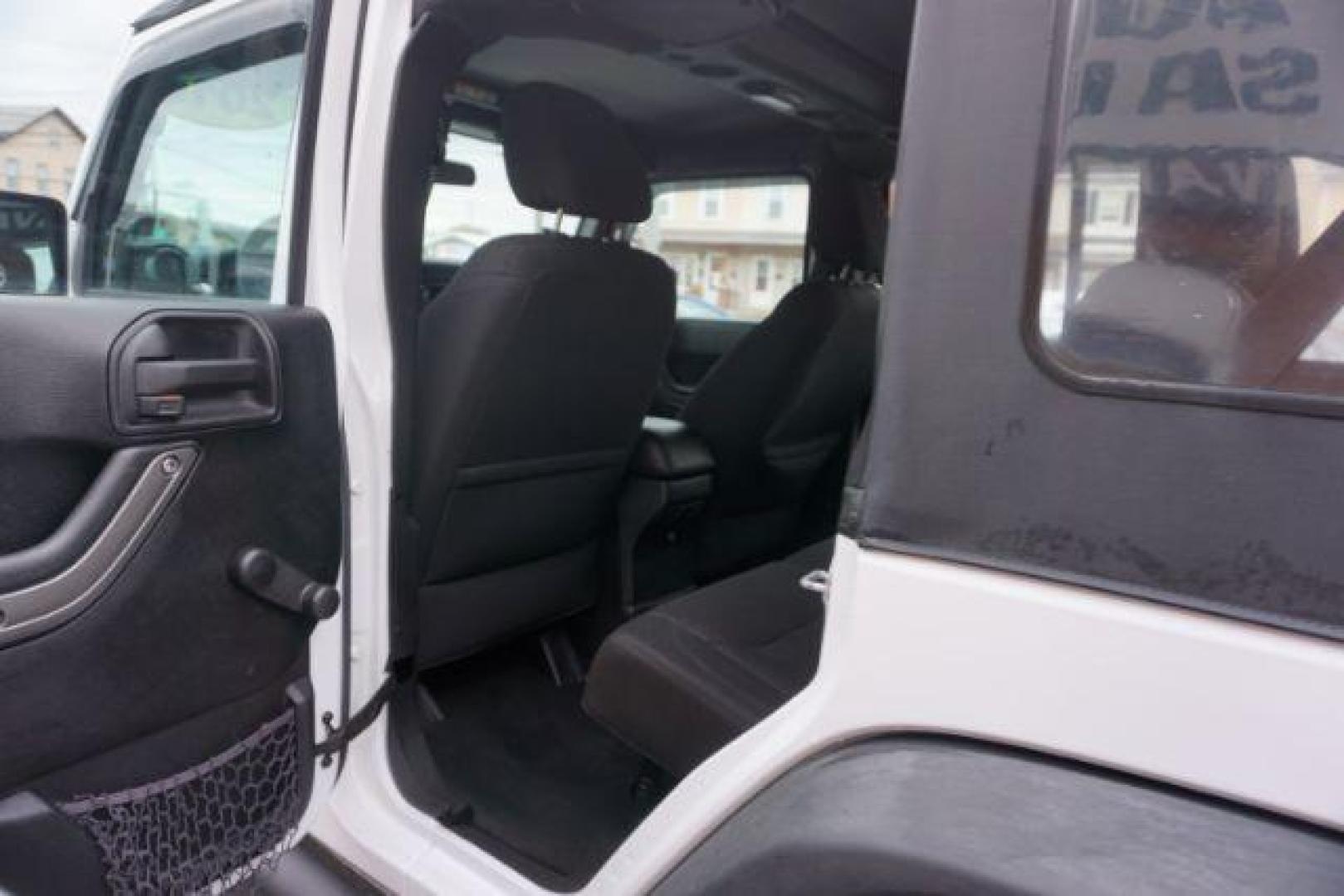 2016 Bright White Clear Coat /Black, cloth Jeep Wrangler Unlimited Sport 4WD (1C4BJWDG3GL) with an 3.6L V6 DOHC 24V FFV engine, located at 312 Centre Ave, Schuylkill Haven, PA, 17972, (570) 593-5278, 40.638130, -76.177383 - Photo#36