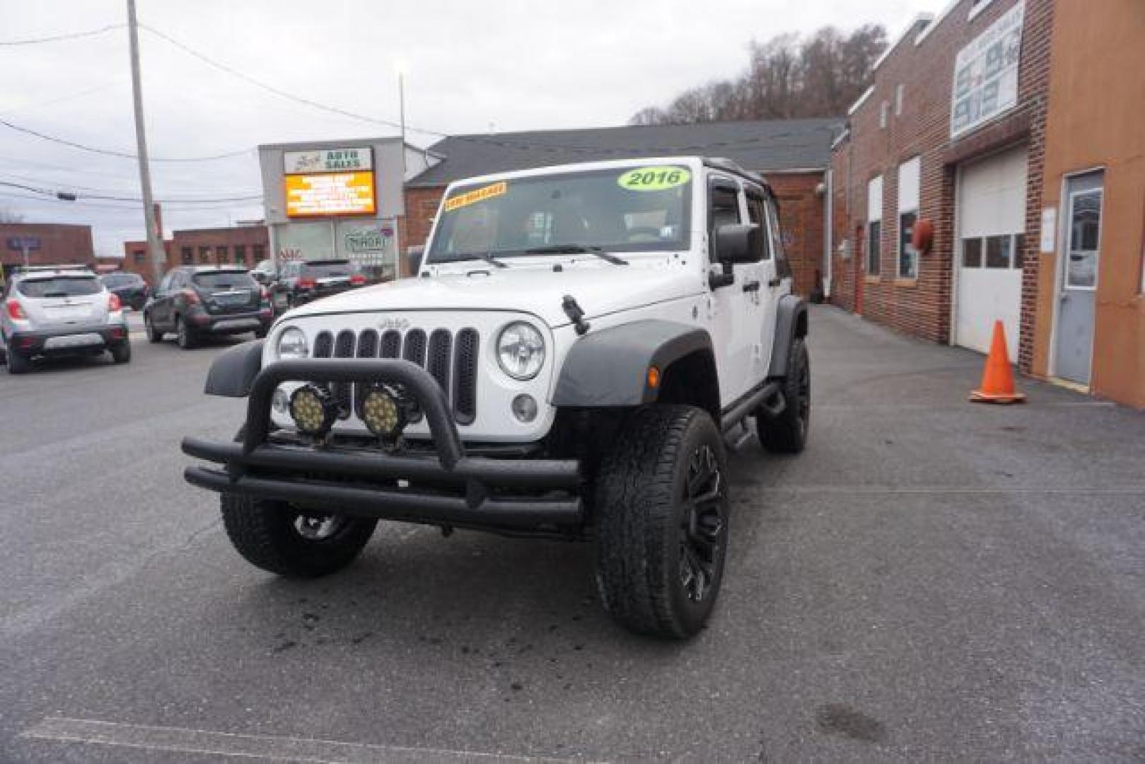 2016 Bright White Clear Coat /Black, cloth Jeep Wrangler Unlimited Sport 4WD (1C4BJWDG3GL) with an 3.6L V6 DOHC 24V FFV engine, located at 312 Centre Ave, Schuylkill Haven, PA, 17972, (570) 593-5278, 40.638130, -76.177383 - Photo#3