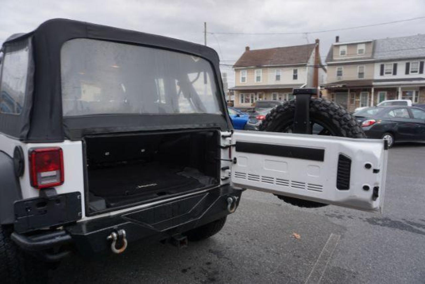 2016 Bright White Clear Coat /Black, cloth Jeep Wrangler Unlimited Sport 4WD (1C4BJWDG3GL) with an 3.6L V6 DOHC 24V FFV engine, located at 312 Centre Ave, Schuylkill Haven, PA, 17972, (570) 593-5278, 40.638130, -76.177383 - Photo#43