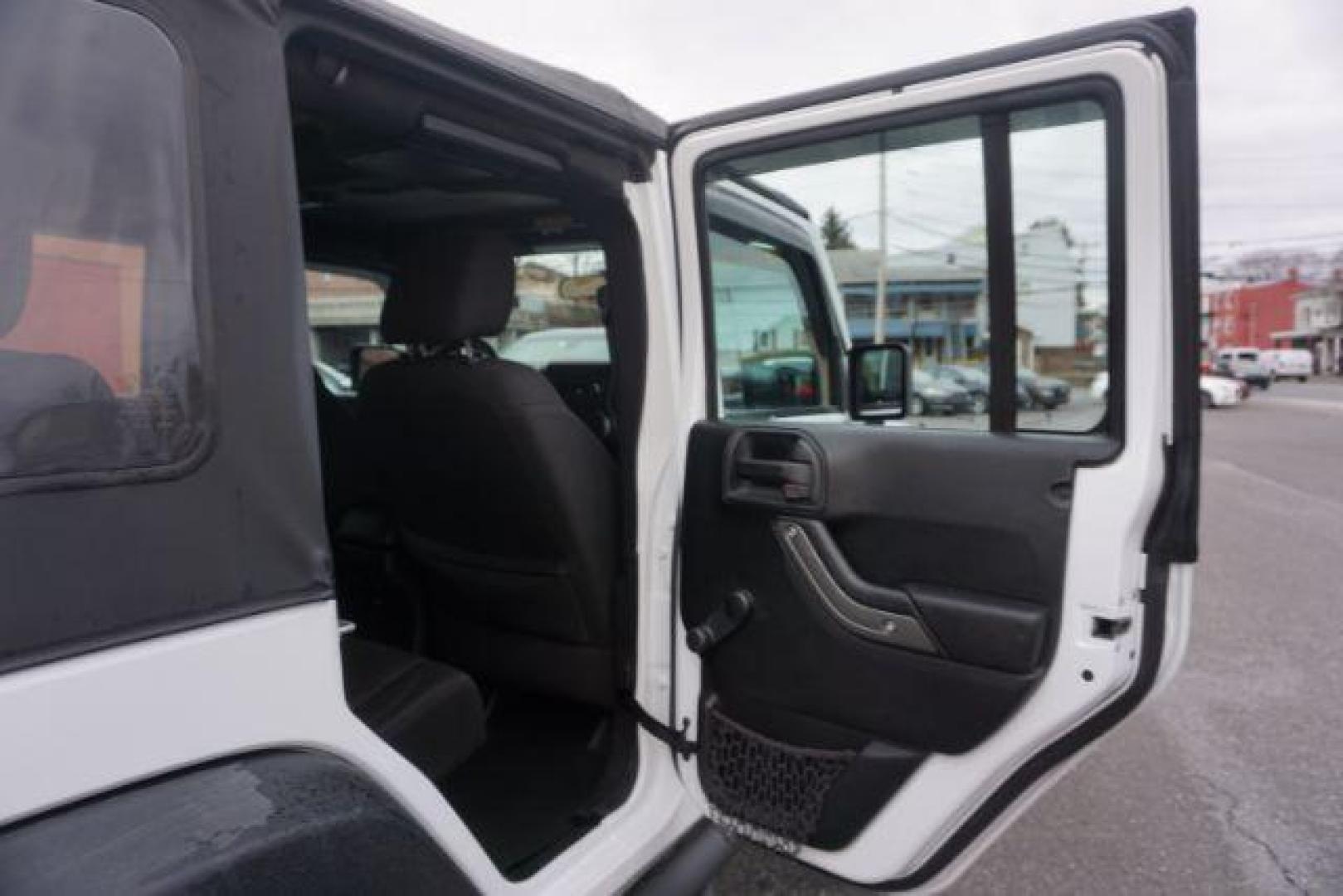 2016 Bright White Clear Coat /Black, cloth Jeep Wrangler Unlimited Sport 4WD (1C4BJWDG3GL) with an 3.6L V6 DOHC 24V FFV engine, located at 312 Centre Ave, Schuylkill Haven, PA, 17972, (570) 593-5278, 40.638130, -76.177383 - Photo#45