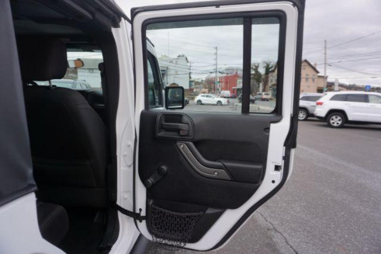 2016 Bright White Clear Coat /Black, cloth Jeep Wrangler Unlimited Sport 4WD (1C4BJWDG3GL) with an 3.6L V6 DOHC 24V FFV engine, located at 312 Centre Ave, Schuylkill Haven, PA, 17972, (570) 593-5278, 40.638130, -76.177383 - Photo#46