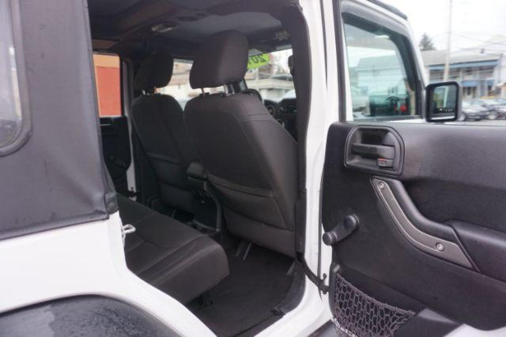 2016 Bright White Clear Coat /Black, cloth Jeep Wrangler Unlimited Sport 4WD (1C4BJWDG3GL) with an 3.6L V6 DOHC 24V FFV engine, located at 312 Centre Ave, Schuylkill Haven, PA, 17972, (570) 593-5278, 40.638130, -76.177383 - Photo#47