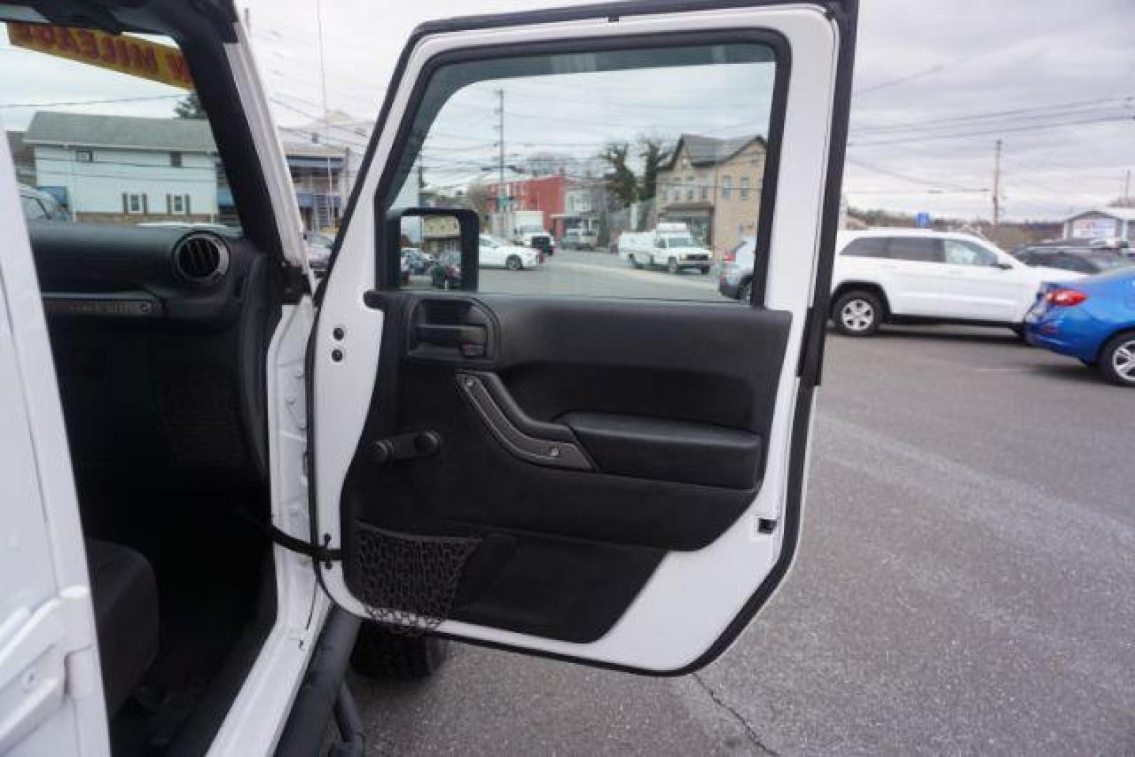 2016 Bright White Clear Coat /Black, cloth Jeep Wrangler Unlimited Sport 4WD (1C4BJWDG3GL) with an 3.6L V6 DOHC 24V FFV engine, located at 312 Centre Ave, Schuylkill Haven, PA, 17972, (570) 593-5278, 40.638130, -76.177383 - Photo#52