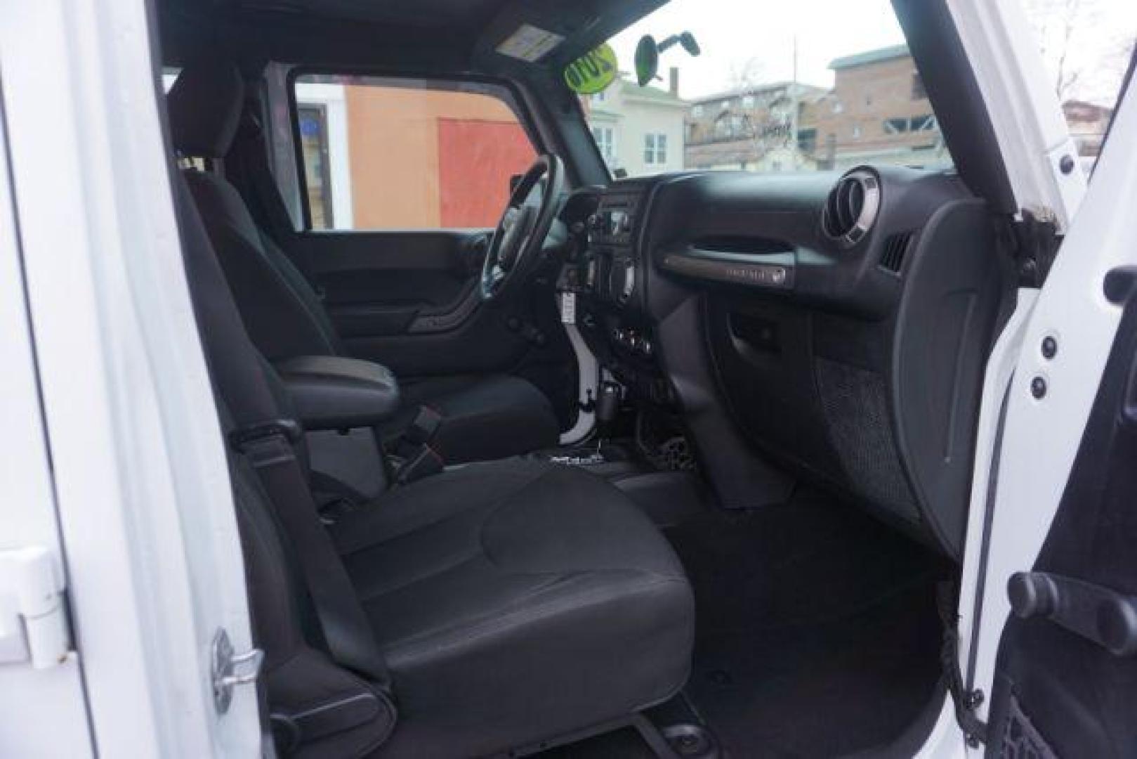 2016 Bright White Clear Coat /Black, cloth Jeep Wrangler Unlimited Sport 4WD (1C4BJWDG3GL) with an 3.6L V6 DOHC 24V FFV engine, located at 312 Centre Ave, Schuylkill Haven, PA, 17972, (570) 593-5278, 40.638130, -76.177383 - Photo#54