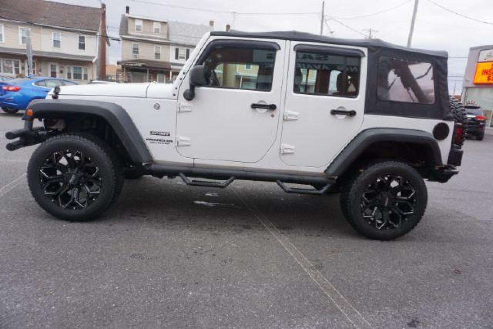 2016 Bright White Clear Coat /Black, cloth Jeep Wrangler Unlimited Sport 4WD (1C4BJWDG3GL) with an 3.6L V6 DOHC 24V FFV engine, located at 312 Centre Ave, Schuylkill Haven, PA, 17972, (570) 593-5278, 40.638130, -76.177383 - Photo#7