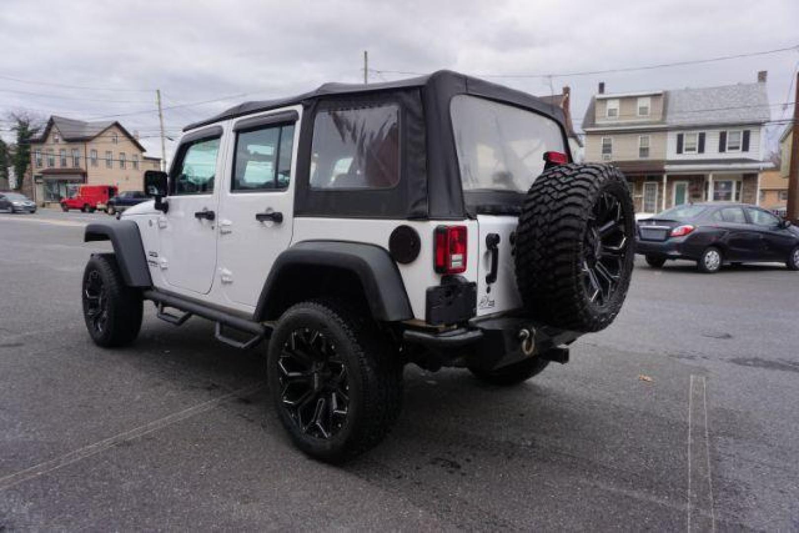 2016 Bright White Clear Coat /Black, cloth Jeep Wrangler Unlimited Sport 4WD (1C4BJWDG3GL) with an 3.6L V6 DOHC 24V FFV engine, located at 312 Centre Ave, Schuylkill Haven, PA, 17972, (570) 593-5278, 40.638130, -76.177383 - Photo#8