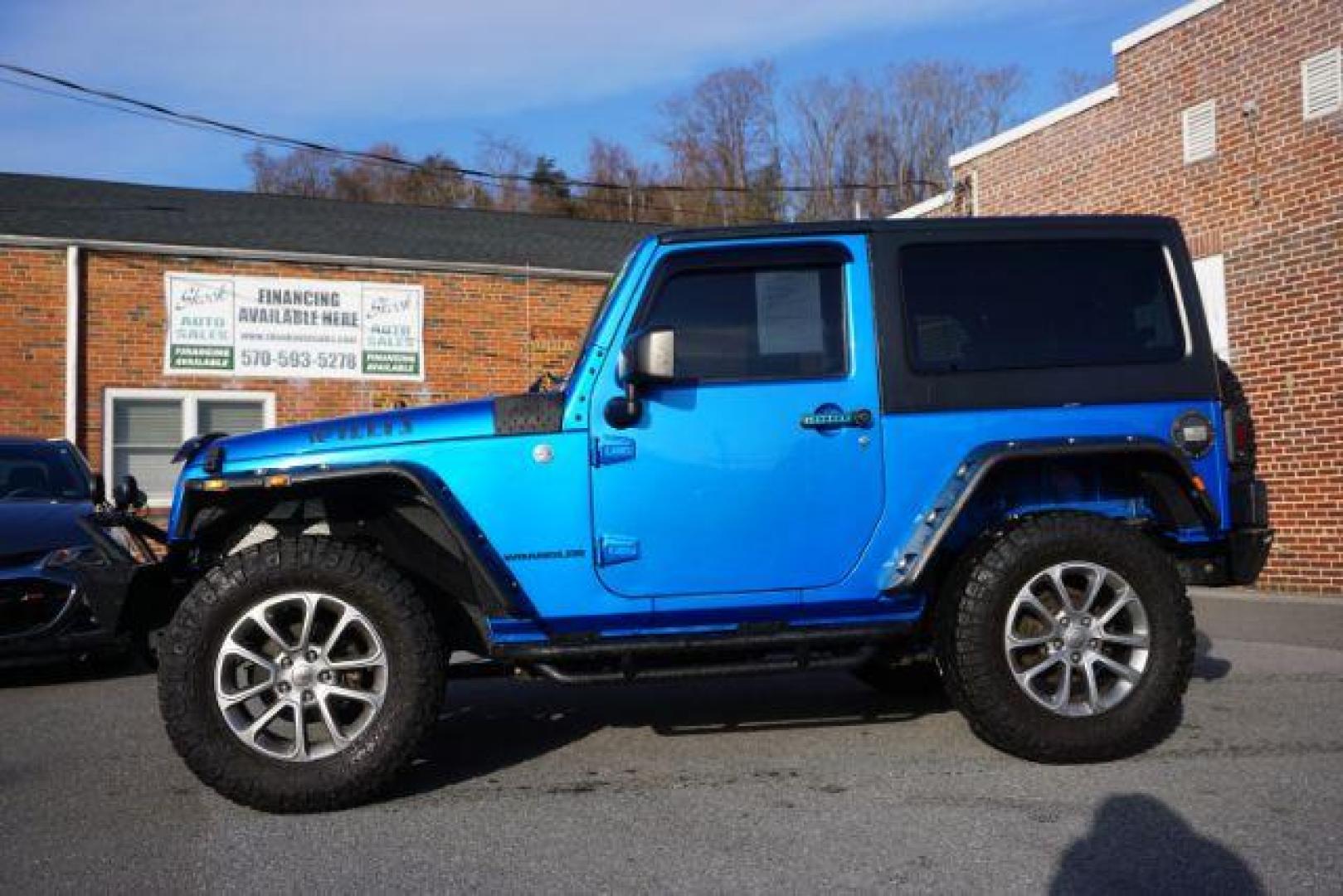 2015 Hydro Blue Pearl Coat /Black Jeep Wrangler Sport 4WD (1C4AJWAG2FL) with an 3.6L V6 DOHC 24V FFV engine, 5-Speed Automatic transmission, located at 312 Centre Ave, Schuylkill Haven, PA, 17972, (570) 593-5278, 40.638130, -76.177383 - bluetooth connection, hard top, locking/limited slip differential, navigation system, towing pkg - Photo#0