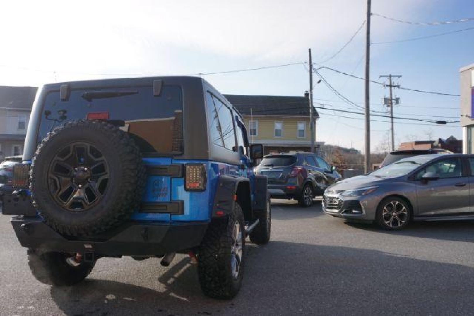 2015 Hydro Blue Pearl Coat /Black Jeep Wrangler Sport 4WD (1C4AJWAG2FL) with an 3.6L V6 DOHC 24V FFV engine, 5-Speed Automatic transmission, located at 312 Centre Ave, Schuylkill Haven, PA, 17972, (570) 593-5278, 40.638130, -76.177383 - bluetooth connection, hard top, locking/limited slip differential, navigation system, towing pkg - Photo#10