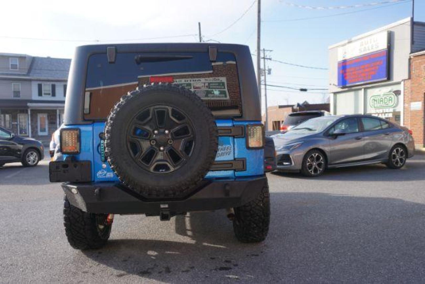 2015 Hydro Blue Pearl Coat /Black Jeep Wrangler Sport 4WD (1C4AJWAG2FL) with an 3.6L V6 DOHC 24V FFV engine, 5-Speed Automatic transmission, located at 312 Centre Ave, Schuylkill Haven, PA, 17972, (570) 593-5278, 40.638130, -76.177383 - bluetooth connection, hard top, locking/limited slip differential, navigation system, towing pkg - Photo#11