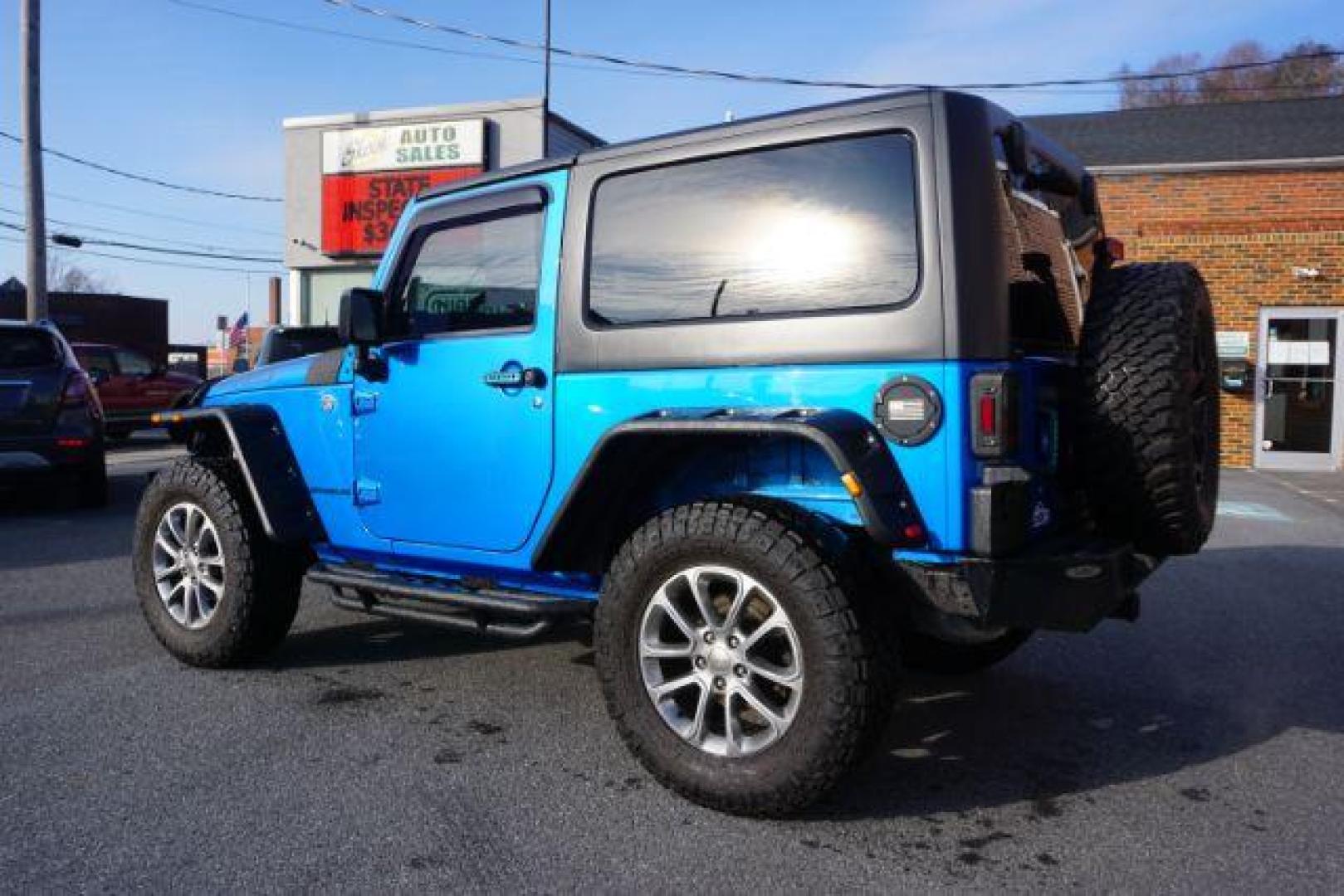 2015 Hydro Blue Pearl Coat /Black Jeep Wrangler Sport 4WD (1C4AJWAG2FL) with an 3.6L V6 DOHC 24V FFV engine, 5-Speed Automatic transmission, located at 312 Centre Ave, Schuylkill Haven, PA, 17972, (570) 593-5278, 40.638130, -76.177383 - bluetooth connection, hard top, locking/limited slip differential, navigation system, towing pkg - Photo#14