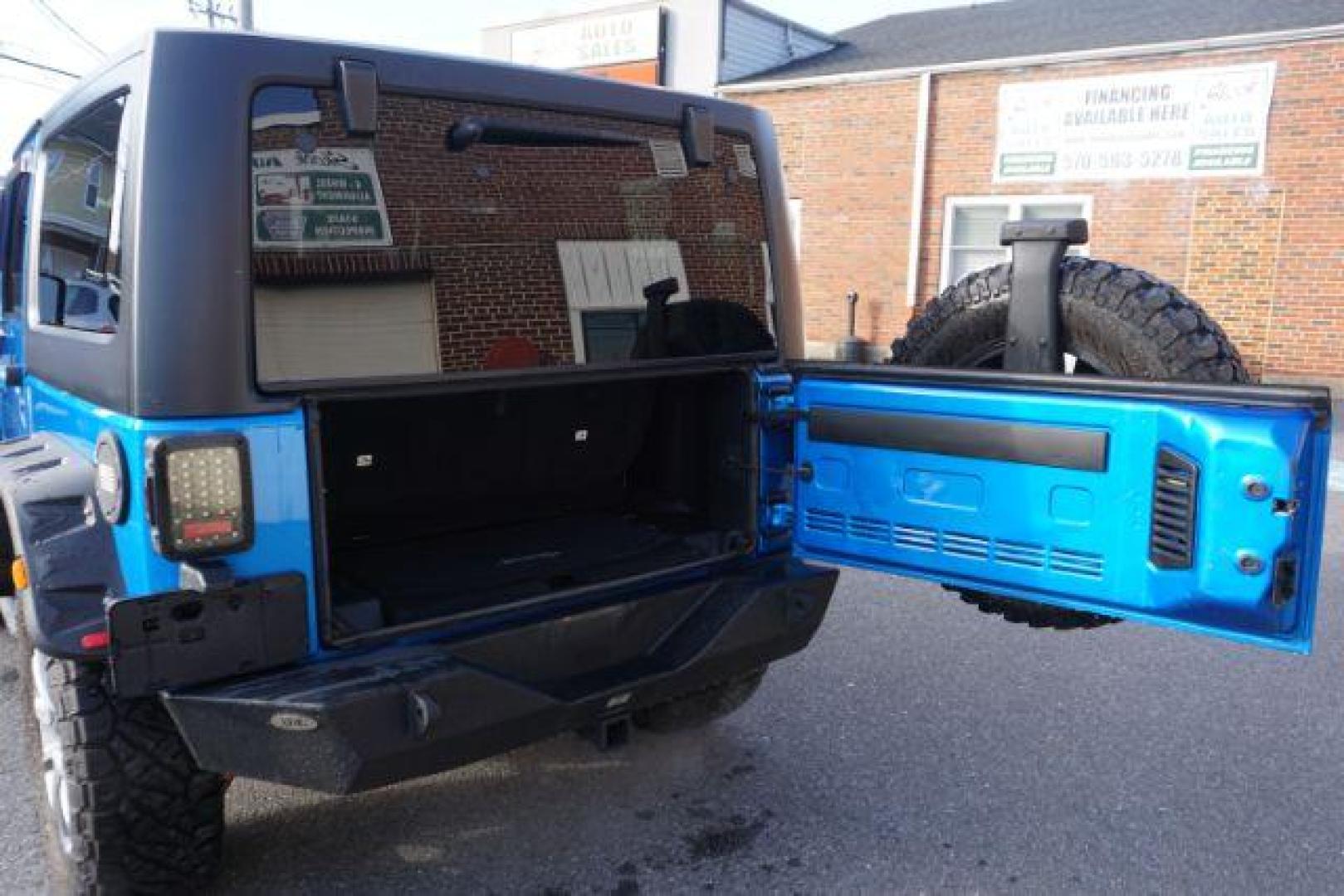 2015 Hydro Blue Pearl Coat /Black Jeep Wrangler Sport 4WD (1C4AJWAG2FL) with an 3.6L V6 DOHC 24V FFV engine, 5-Speed Automatic transmission, located at 312 Centre Ave, Schuylkill Haven, PA, 17972, (570) 593-5278, 40.638130, -76.177383 - bluetooth connection, hard top, locking/limited slip differential, navigation system, towing pkg - Photo#33